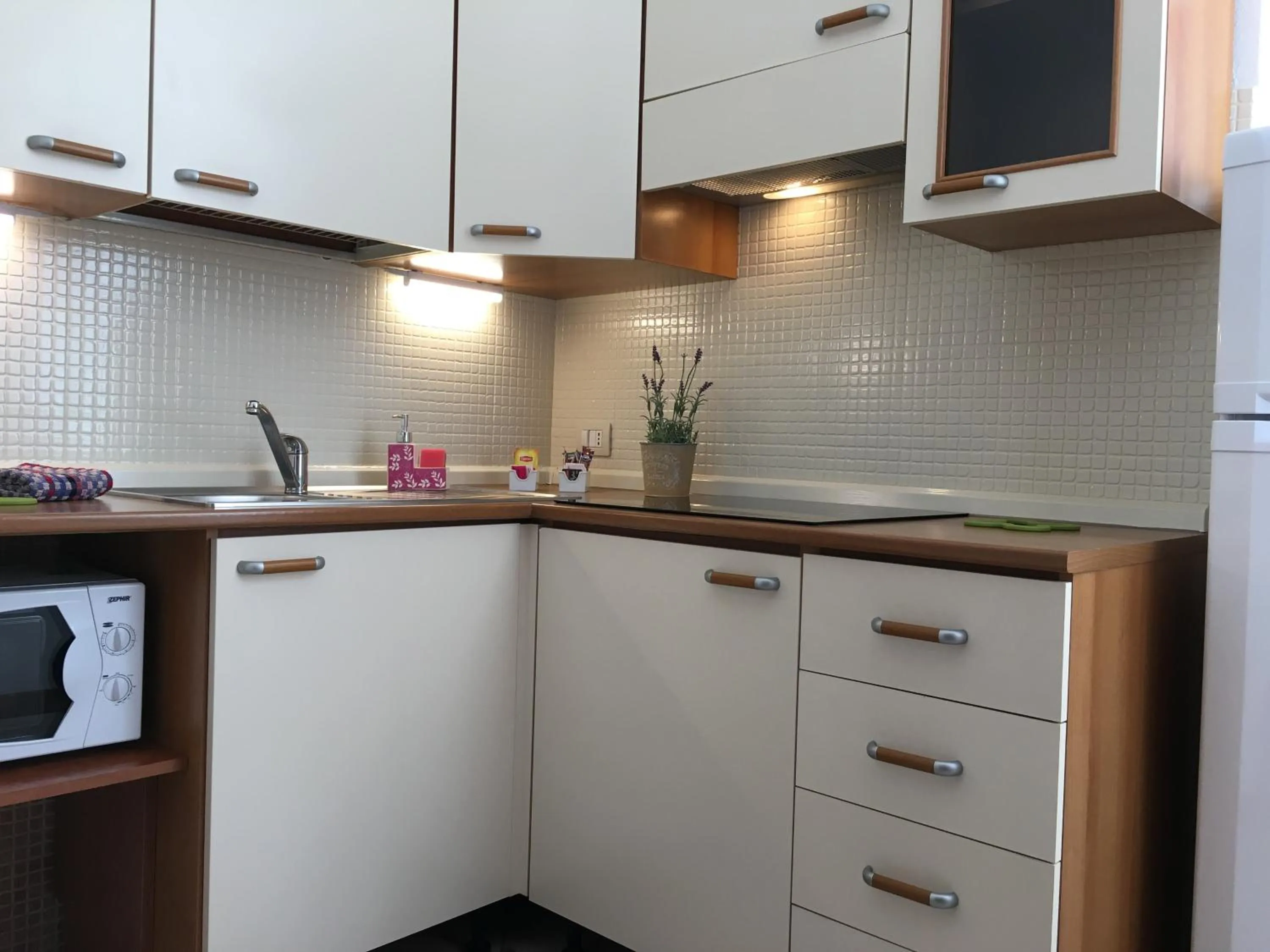 Kitchen or kitchenette in Residence Gloria