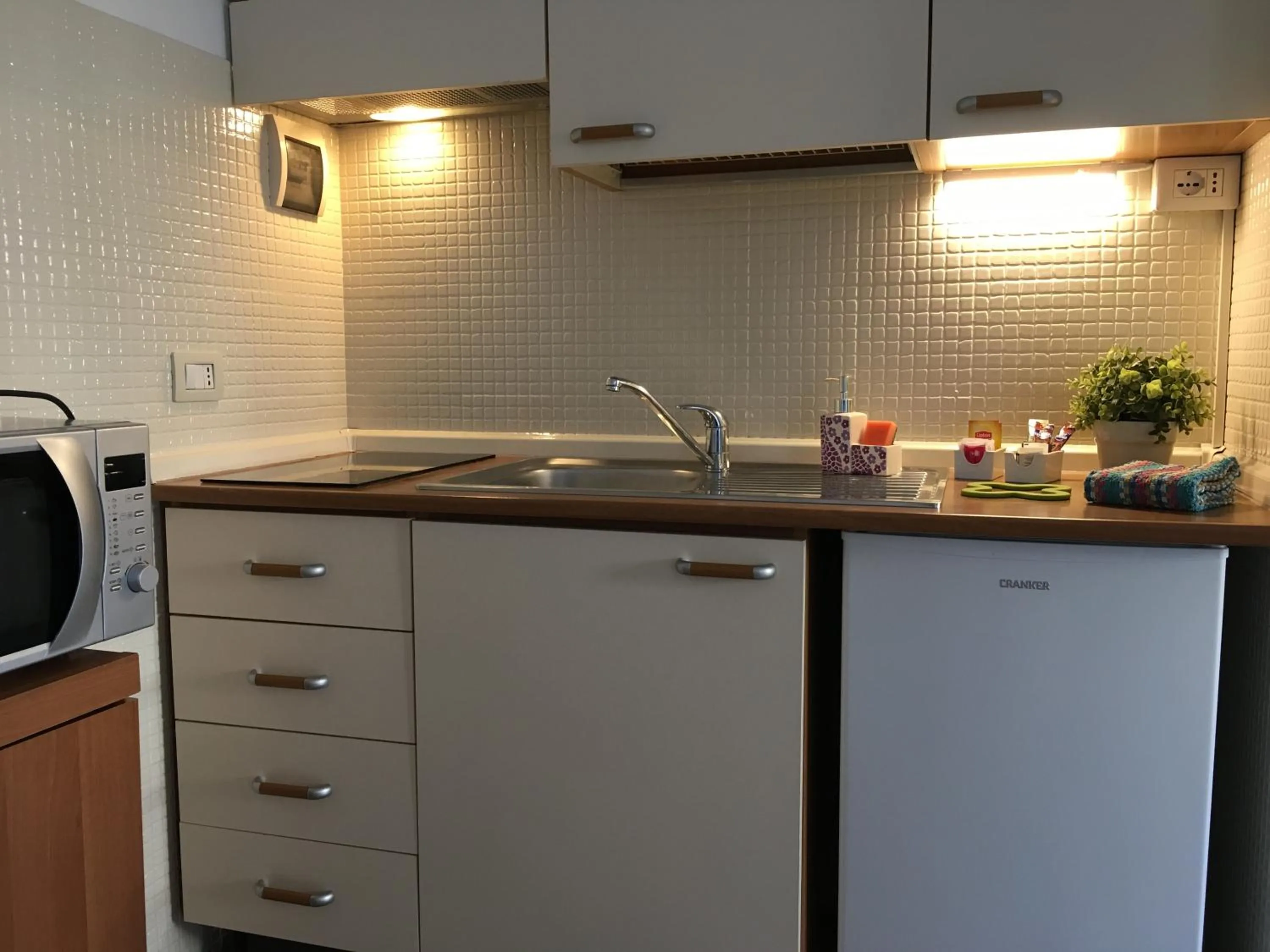 Kitchen or kitchenette in Residence Gloria