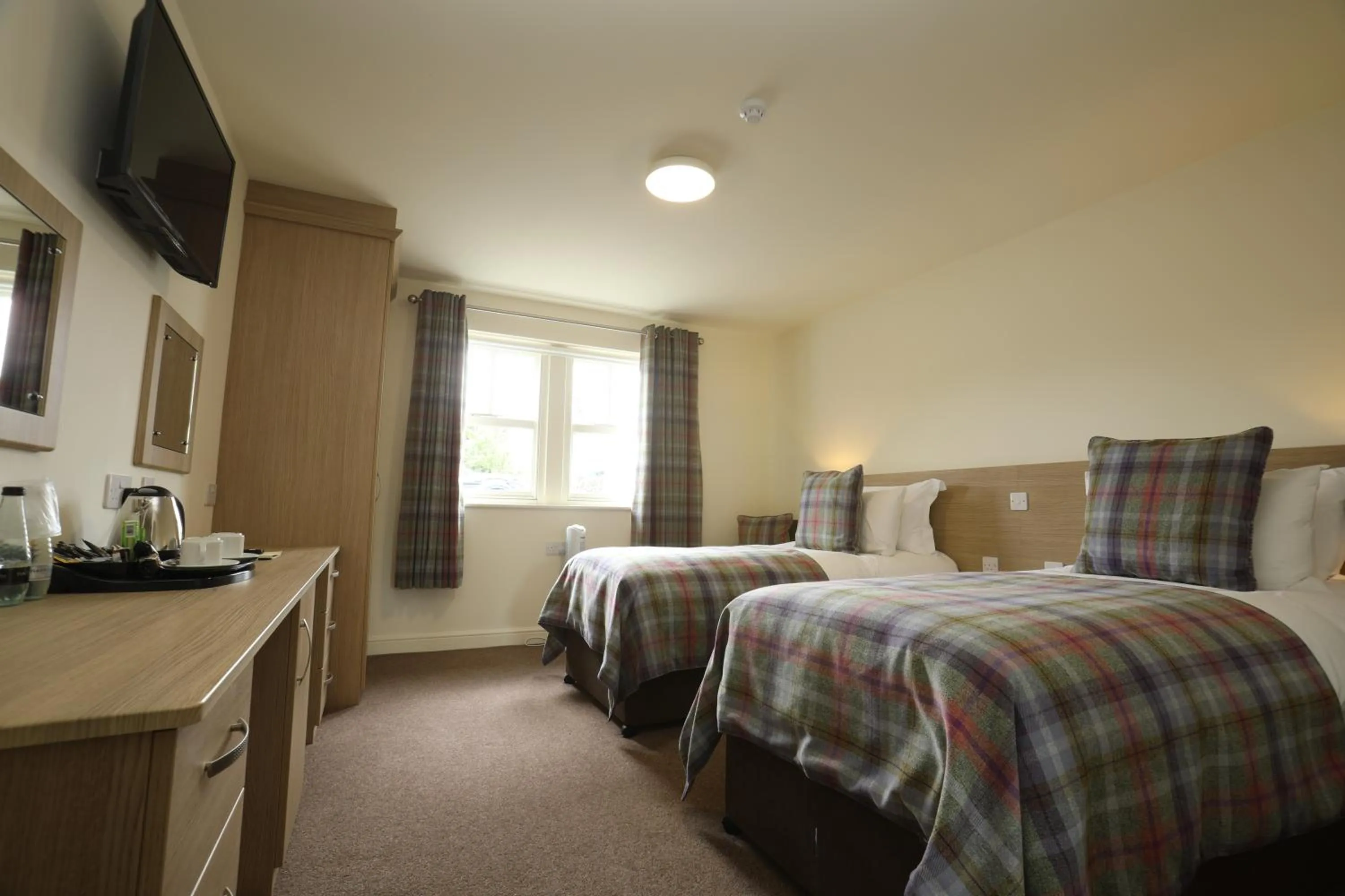 Bed in The Craven Heifer Inn