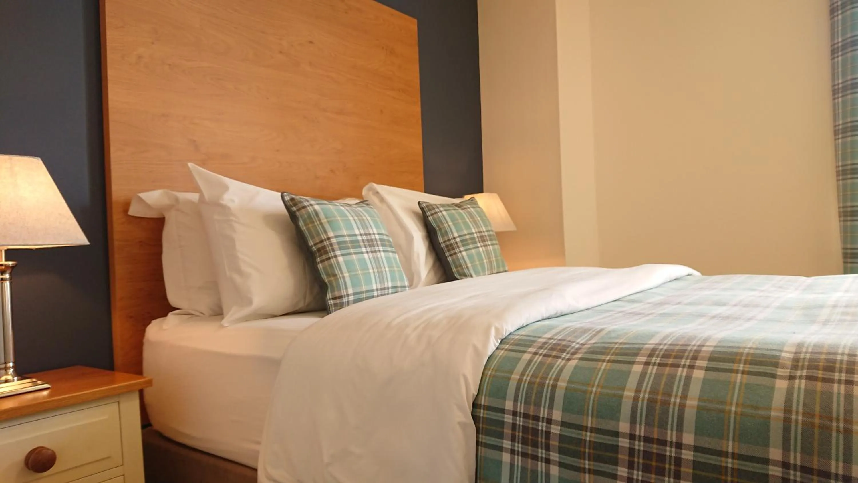 Bed in The Craven Heifer Inn