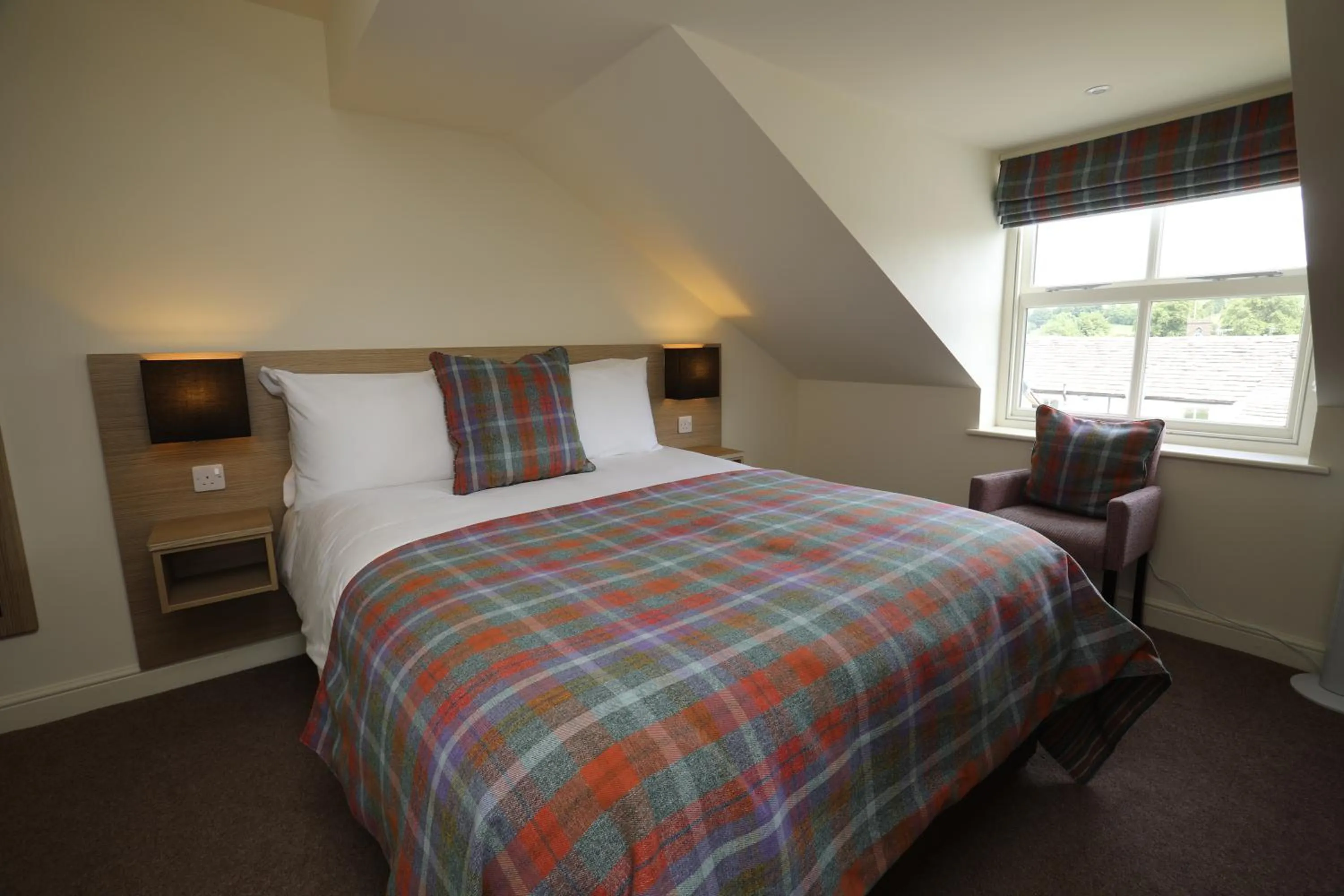 Bed in The Craven Heifer Inn