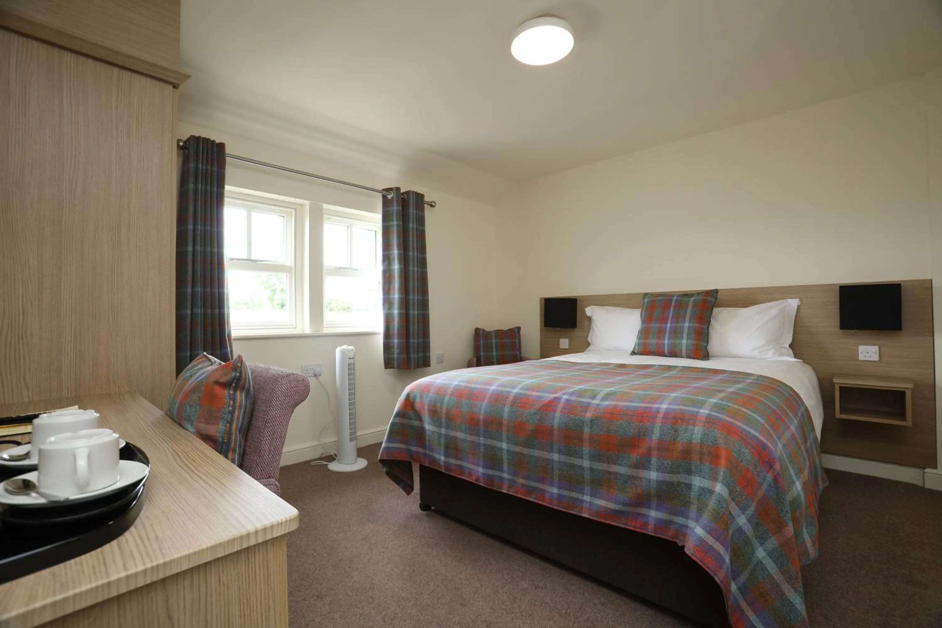 Bed in The Craven Heifer Inn