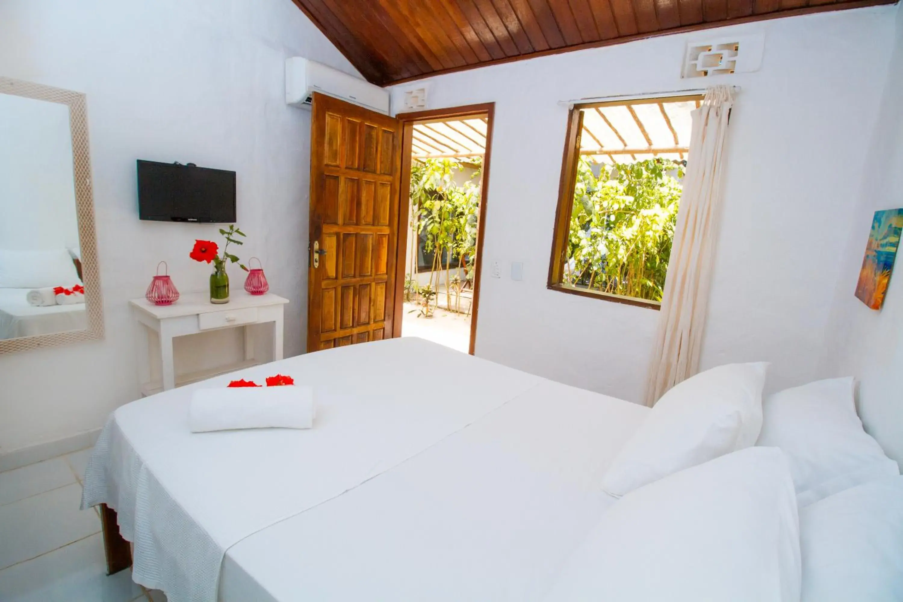 Bed in Travel Inn Pousadas & Beach Club Trancoso Bed in Travel Inn Pousadas & Beach Club Trancoso