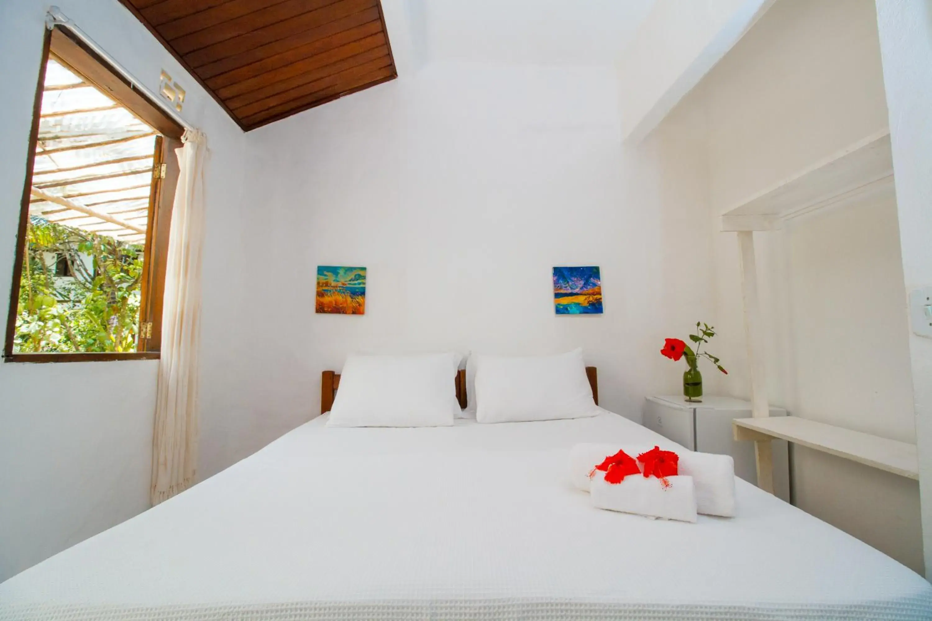 Bed in Travel Inn Pousadas & Beach Club Trancoso Bed in Travel Inn Pousadas & Beach Club Trancoso