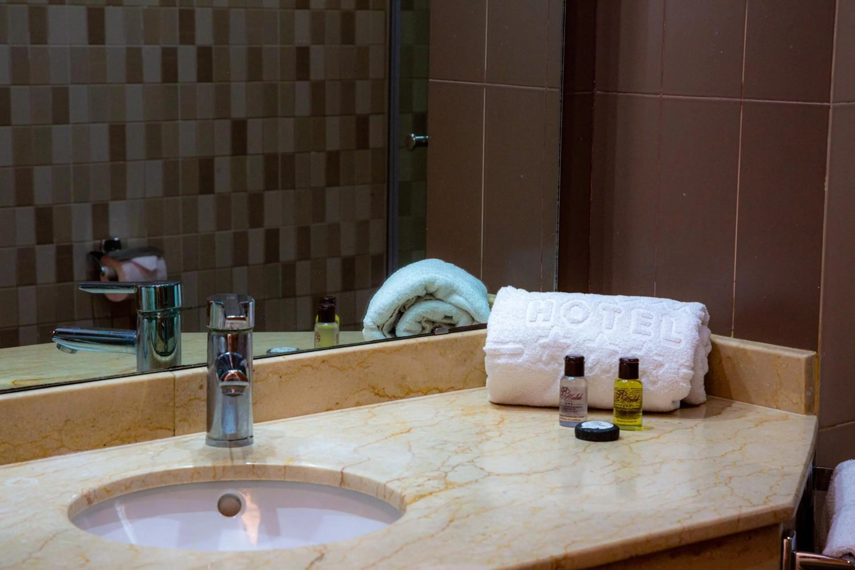 Bathroom in Malak Hotel