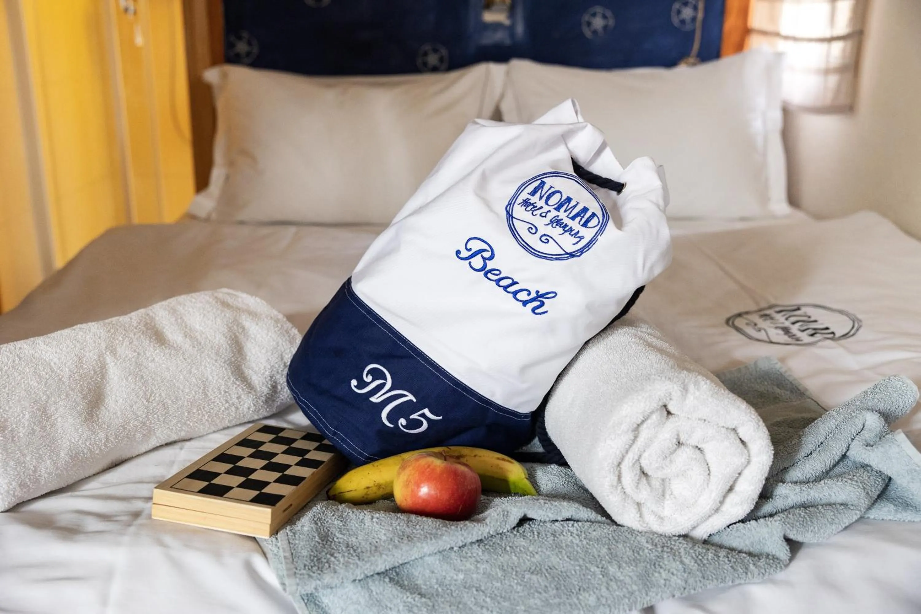 towels, Bed in Nomad Hotel & Glamping
