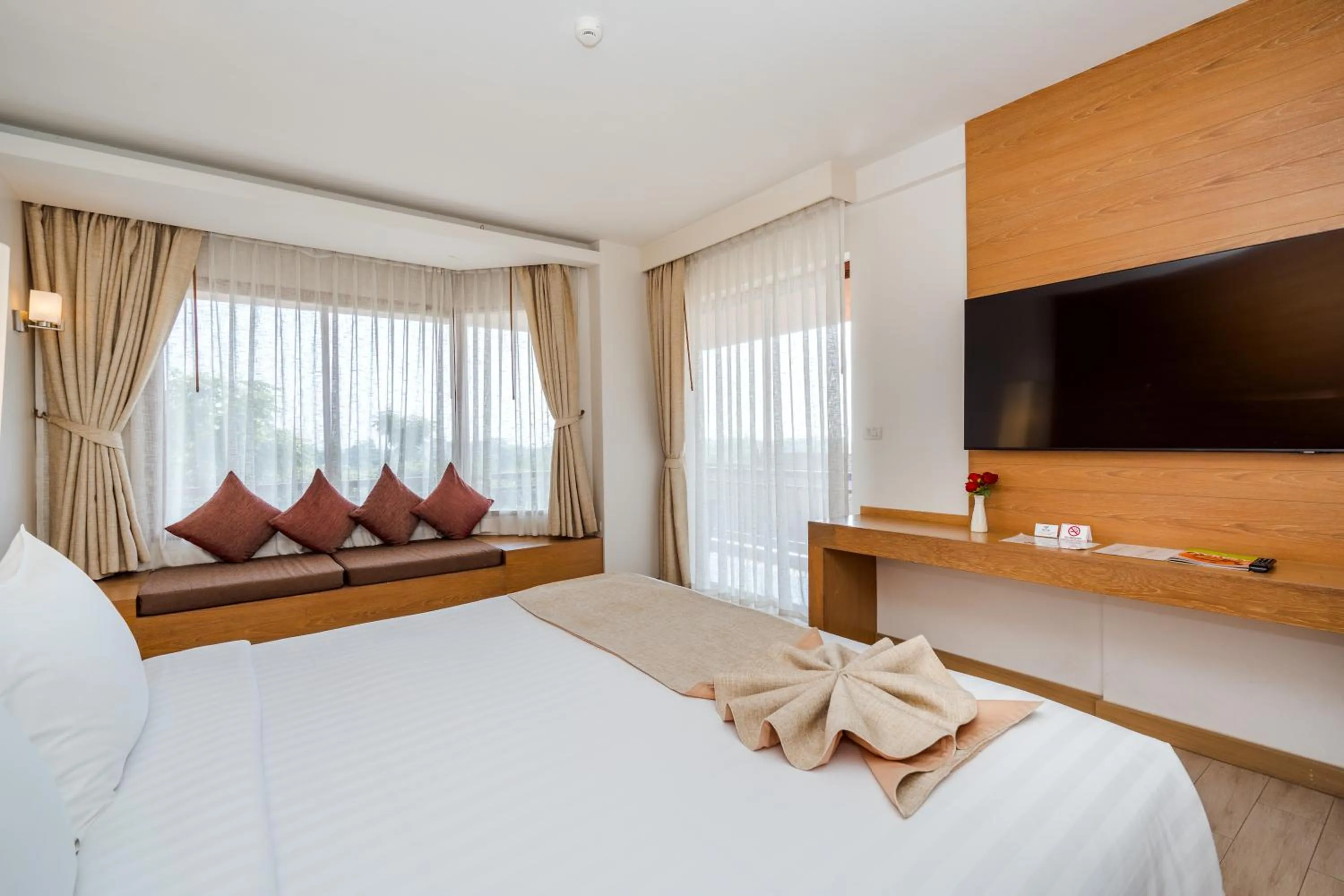 Bed in Ayrest Hua Hin Hotel