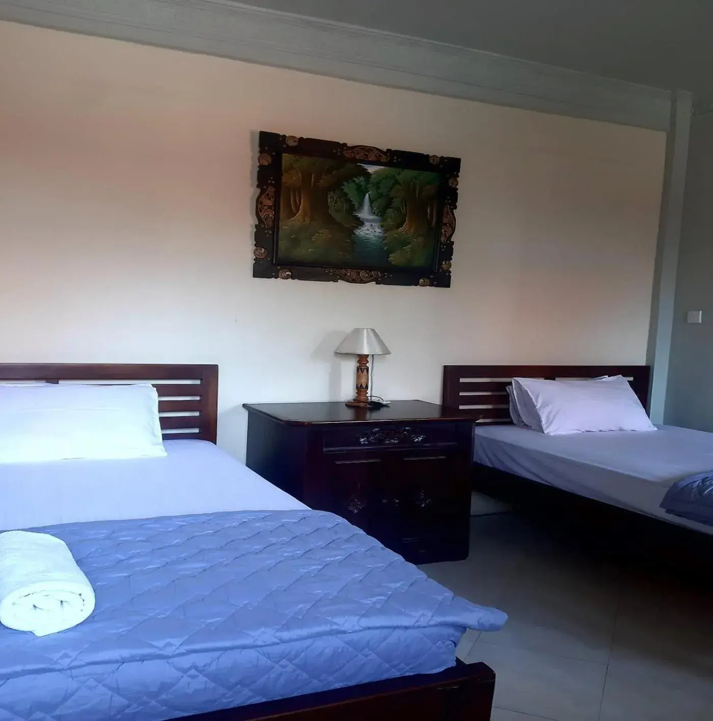 Bed in The Reinhold Guesthouse Bali Bed in The Reinhold Guesthouse Bali