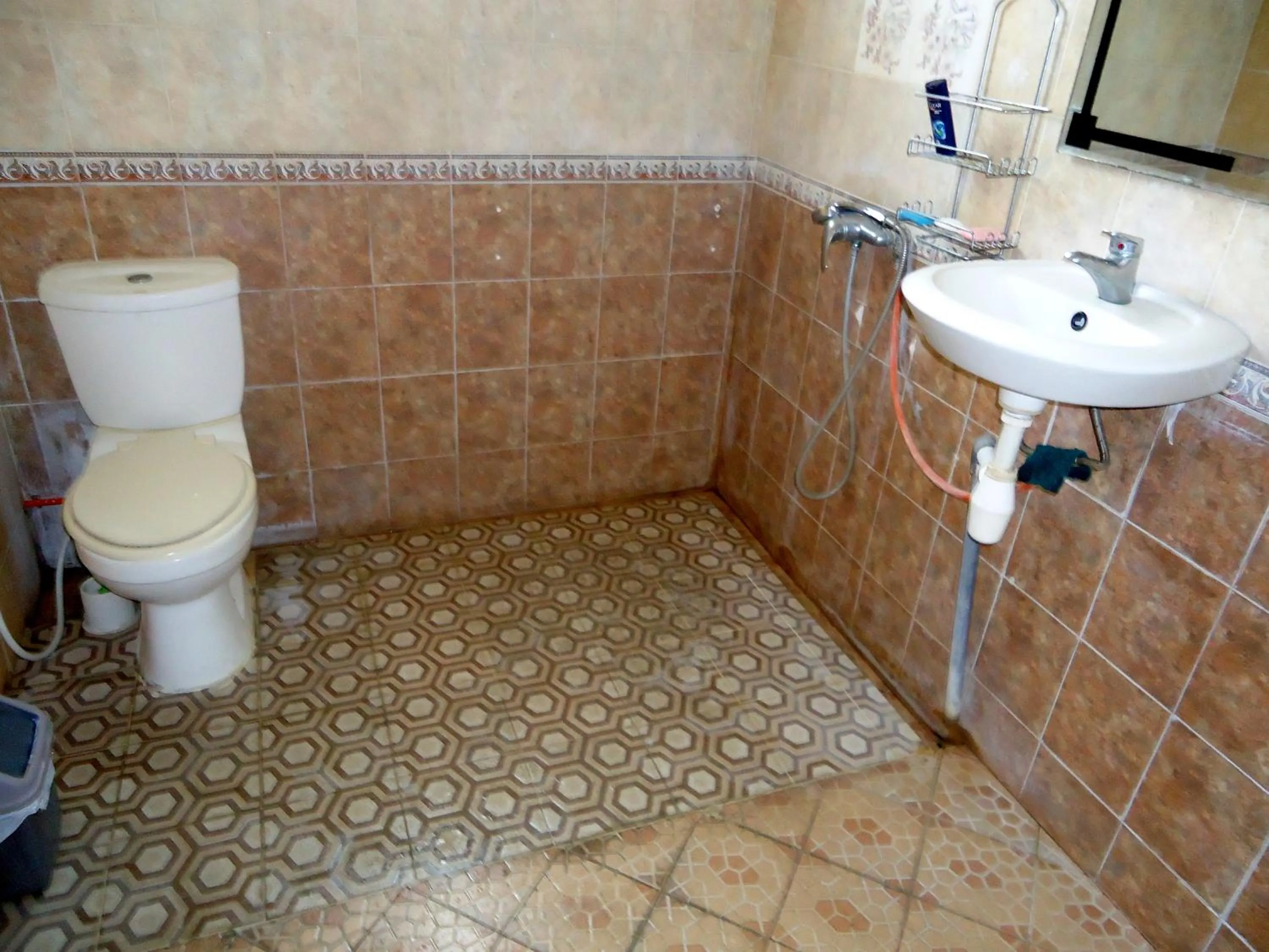 Toilet in The Reinhold Guesthouse Bali