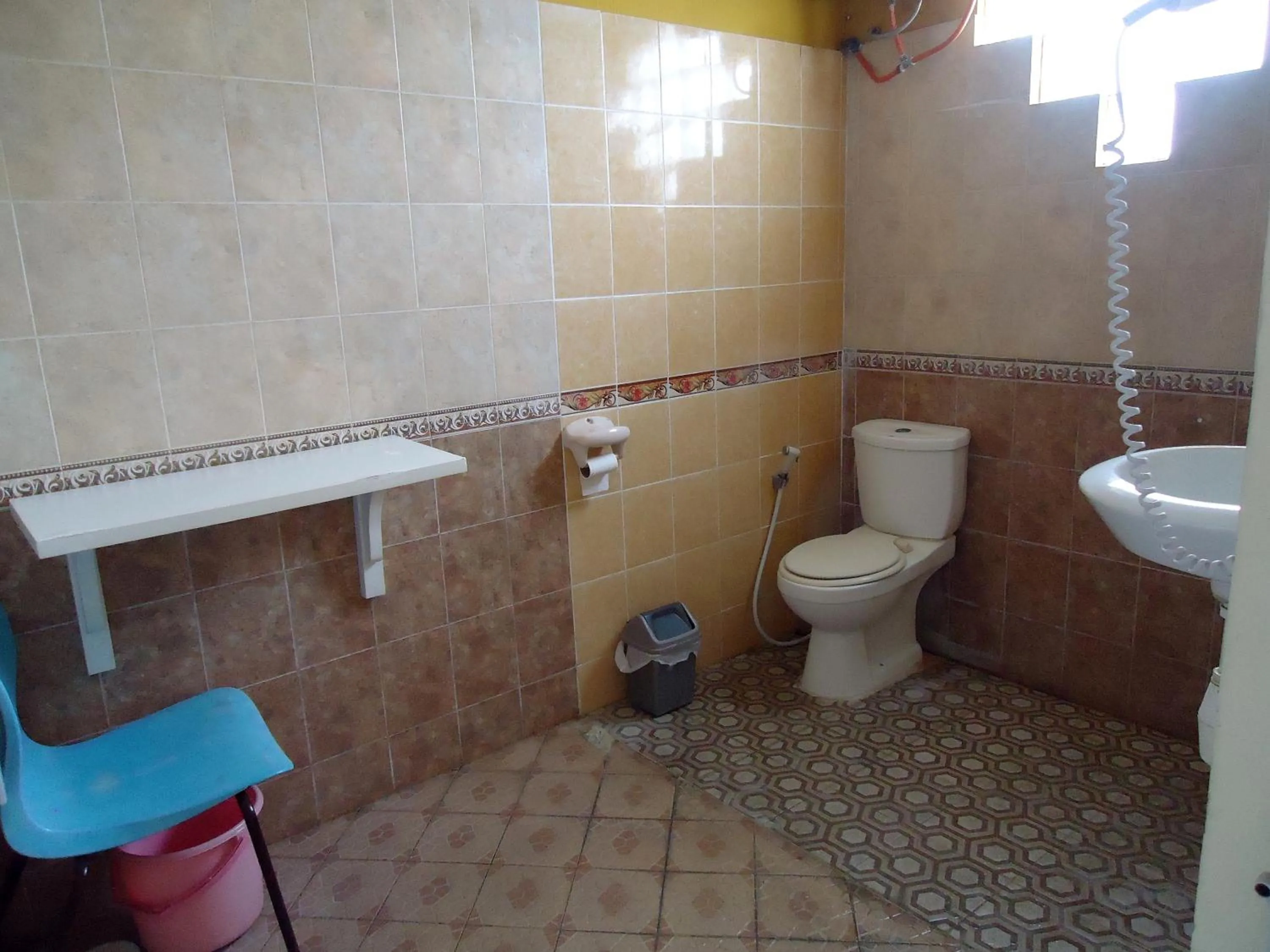 Toilet in The Reinhold Guesthouse Bali