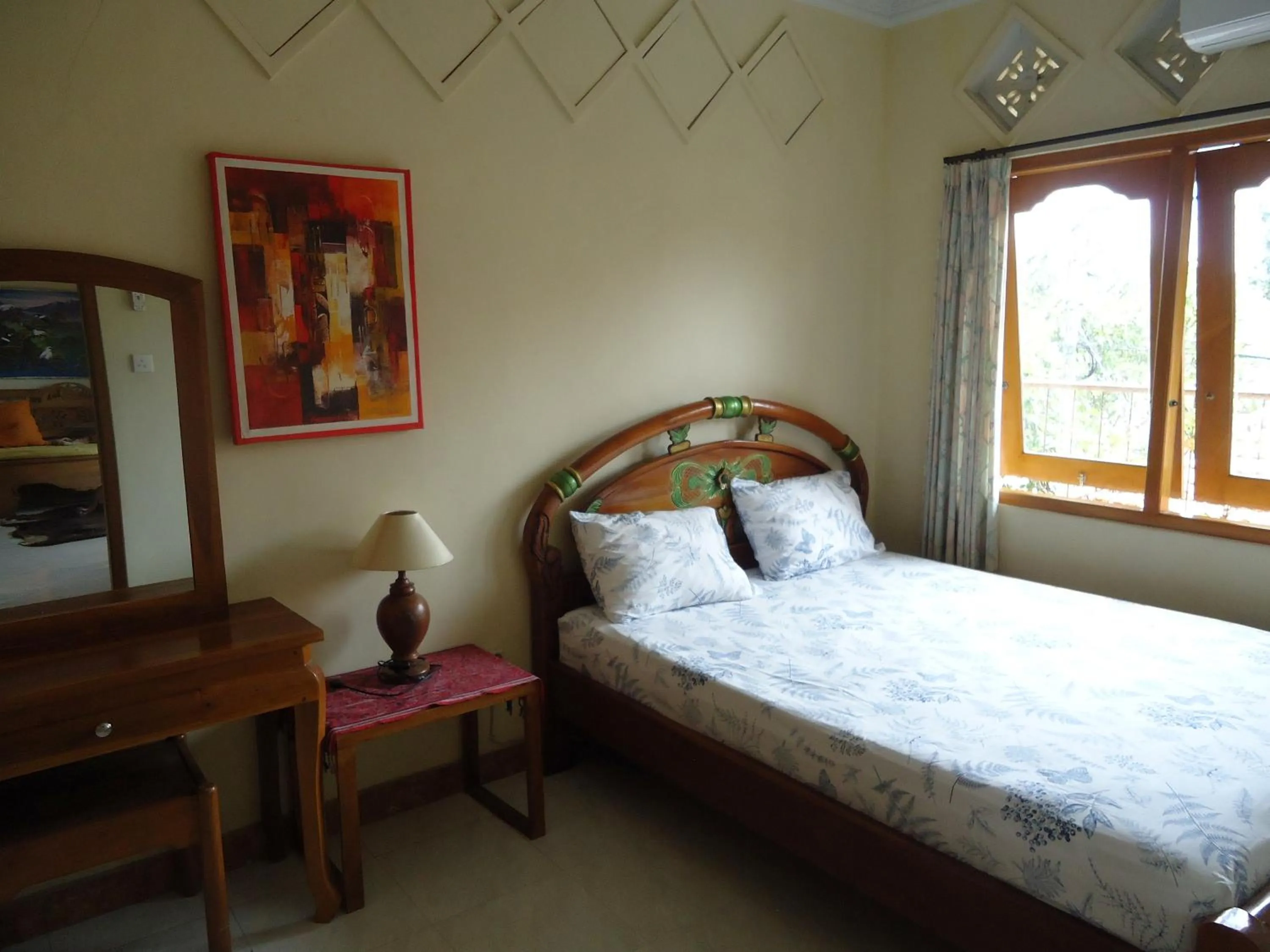 Photo of the whole room, Bed in The Reinhold Guesthouse Bali