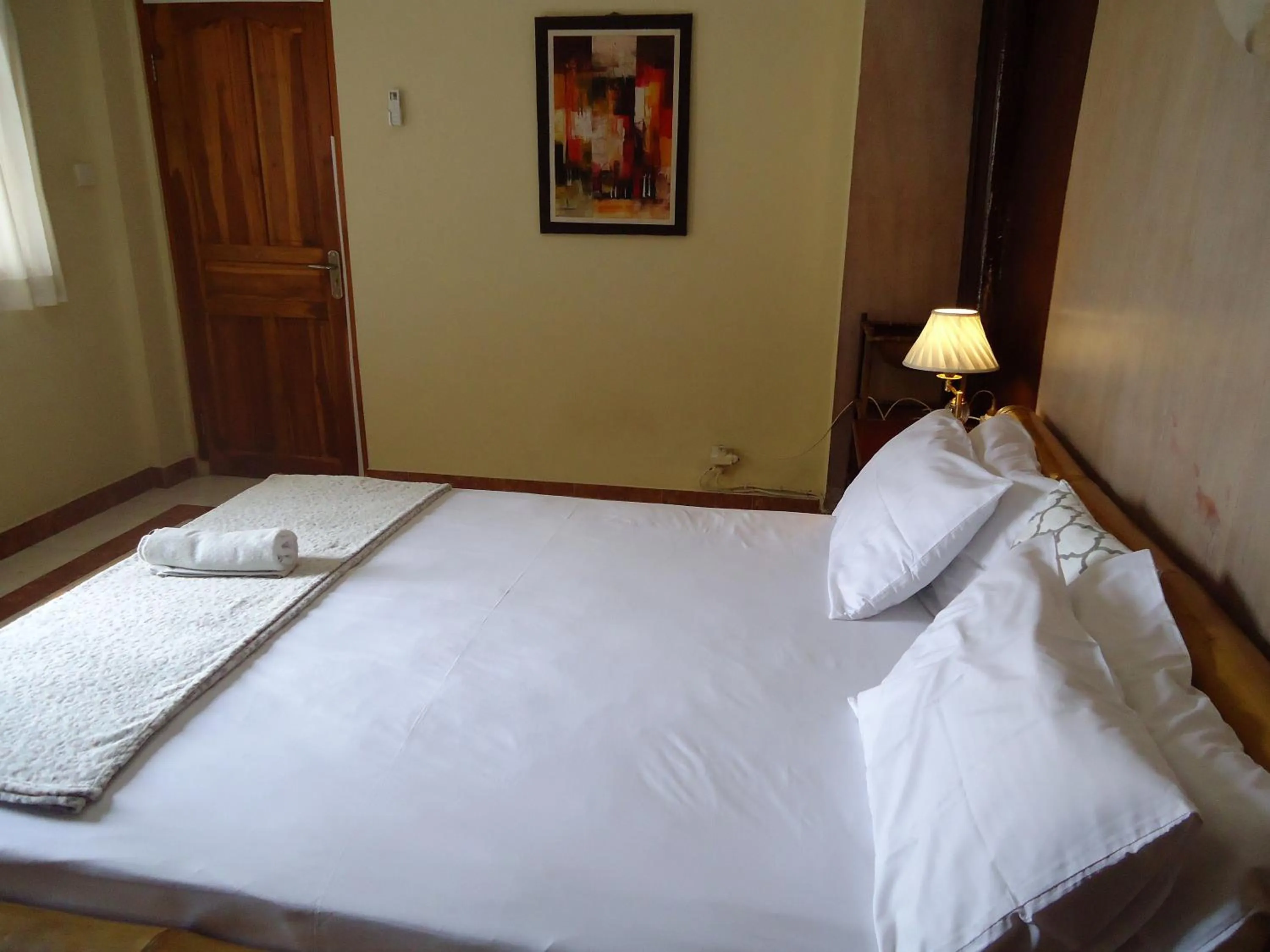 Bed in The Reinhold Guesthouse Bali