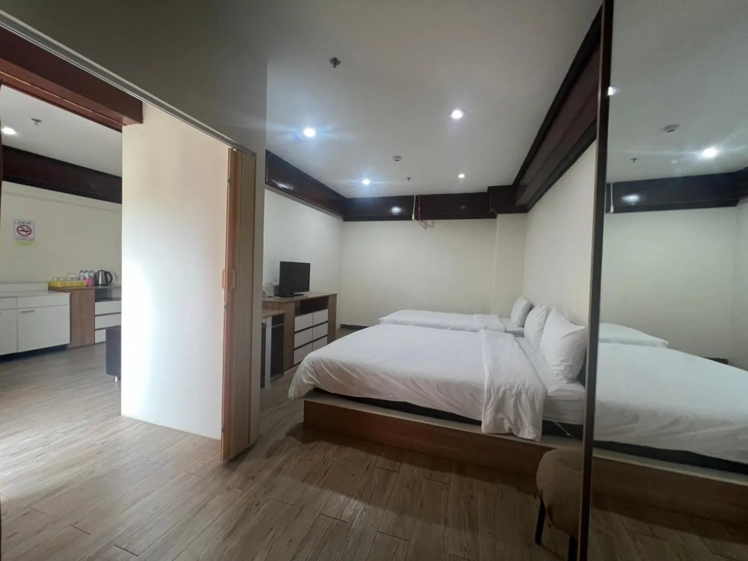 Bed in Komol Residence Bangkok