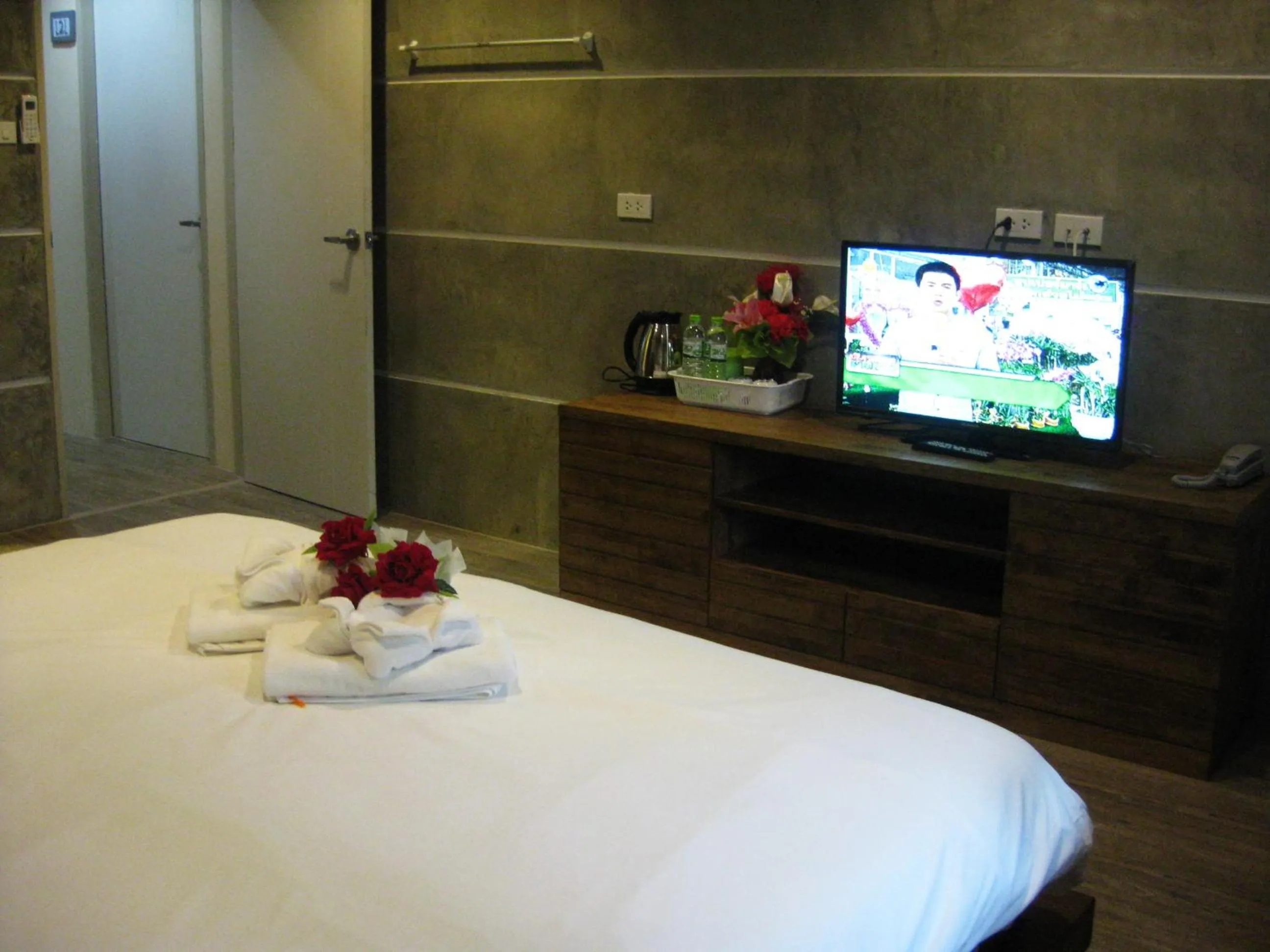 Bed in Komol Residence Bangkok