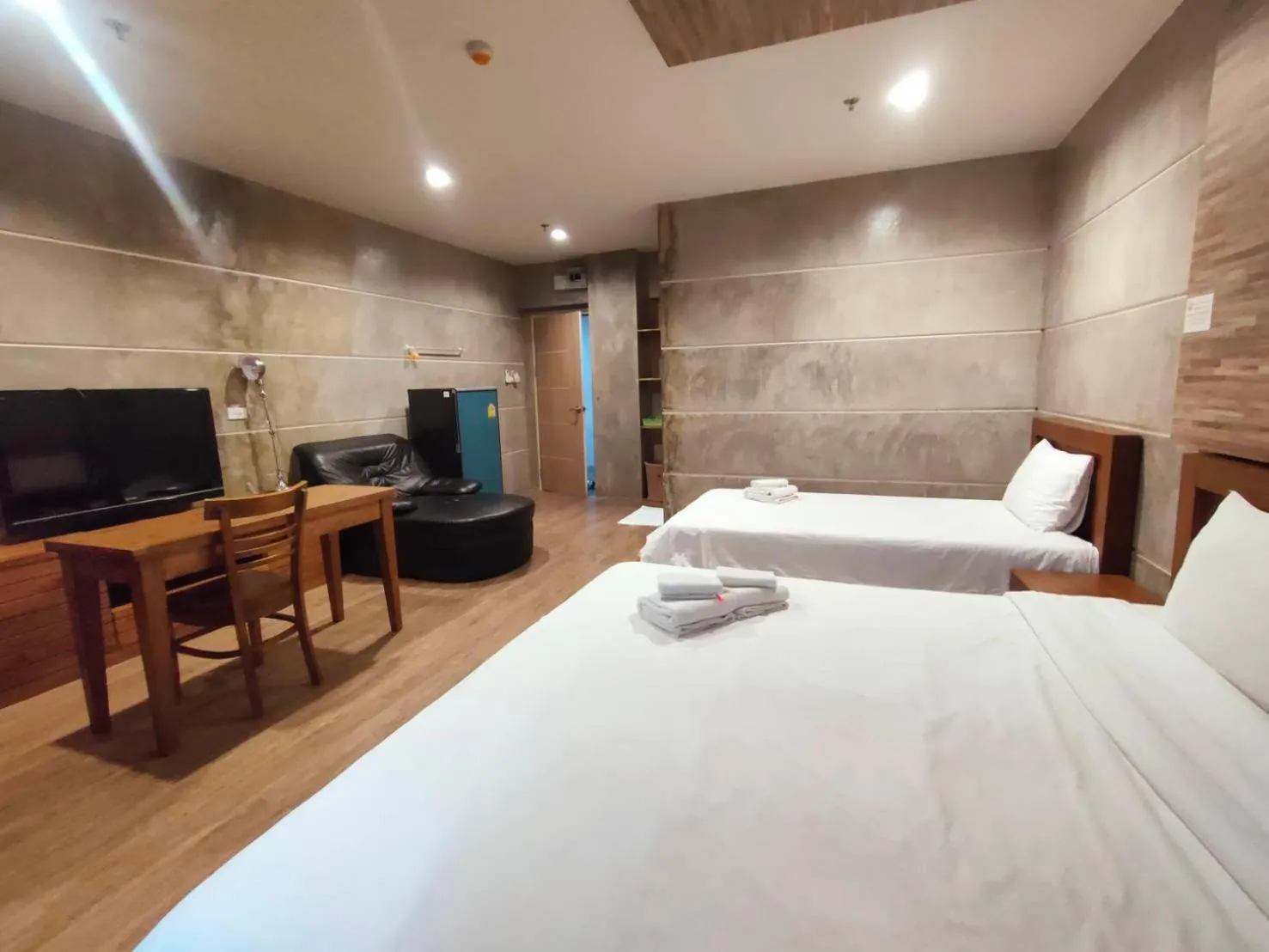 Bed in Komol Residence Bangkok