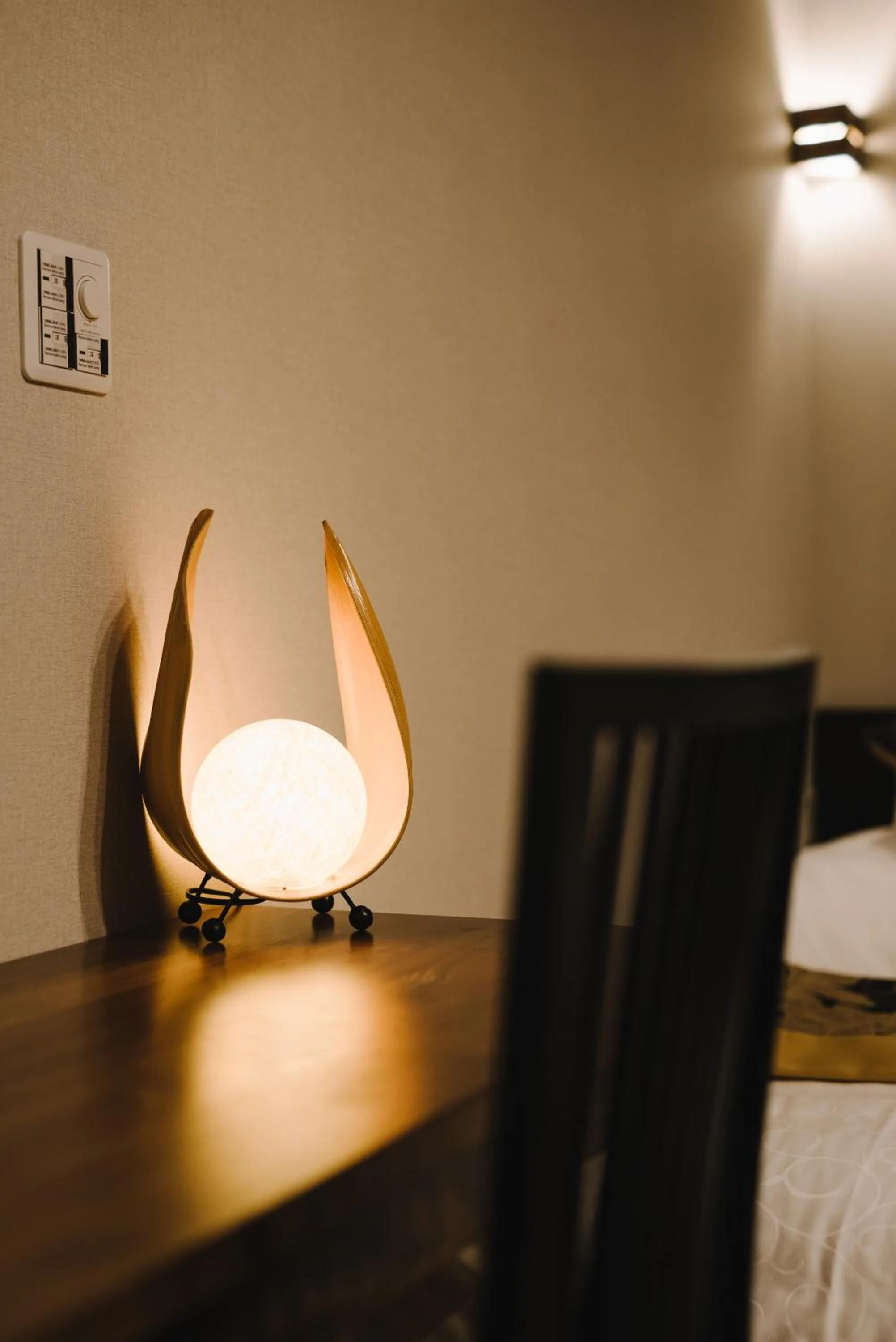 Decorative detail, Bed in GRAND BASE Karatsu Ekiminami