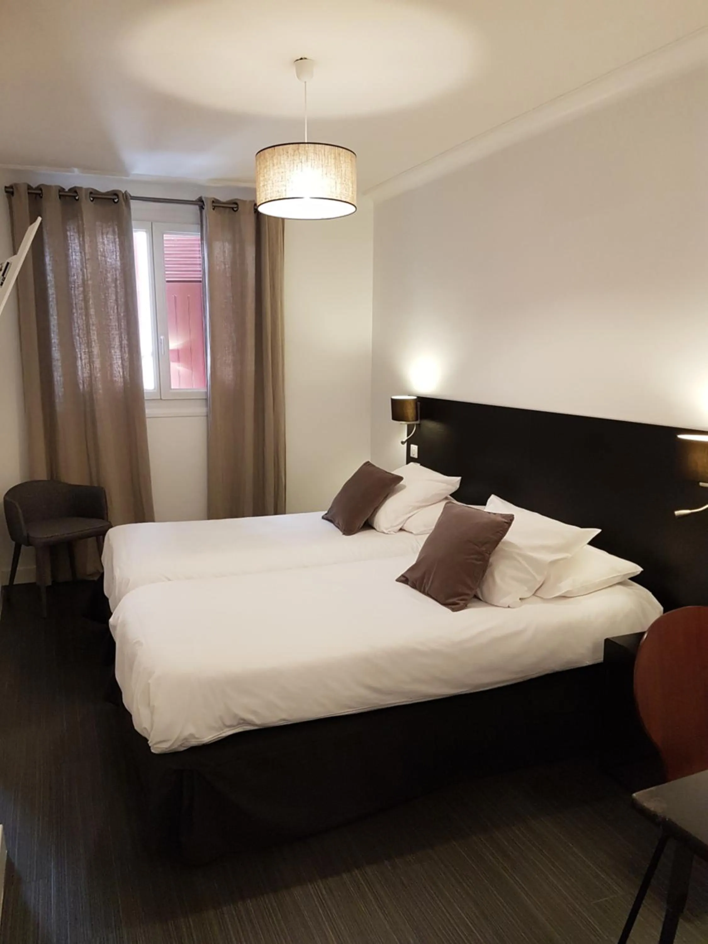 Bed in Hôtel Au Bon Coin