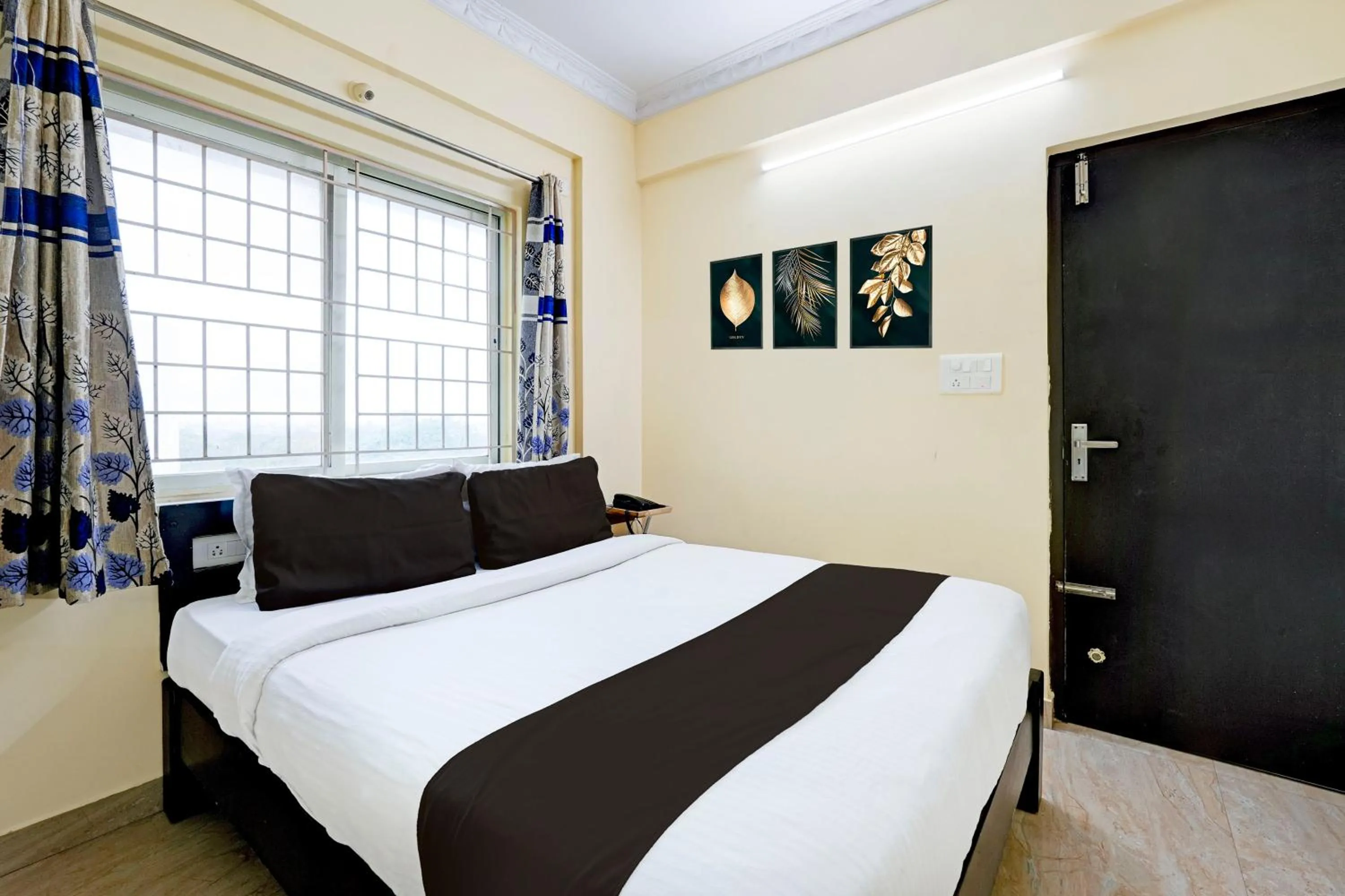 Bedroom in Hotel O Ganakkal Near BGS Hospital Junction formerly Omkar Inn.