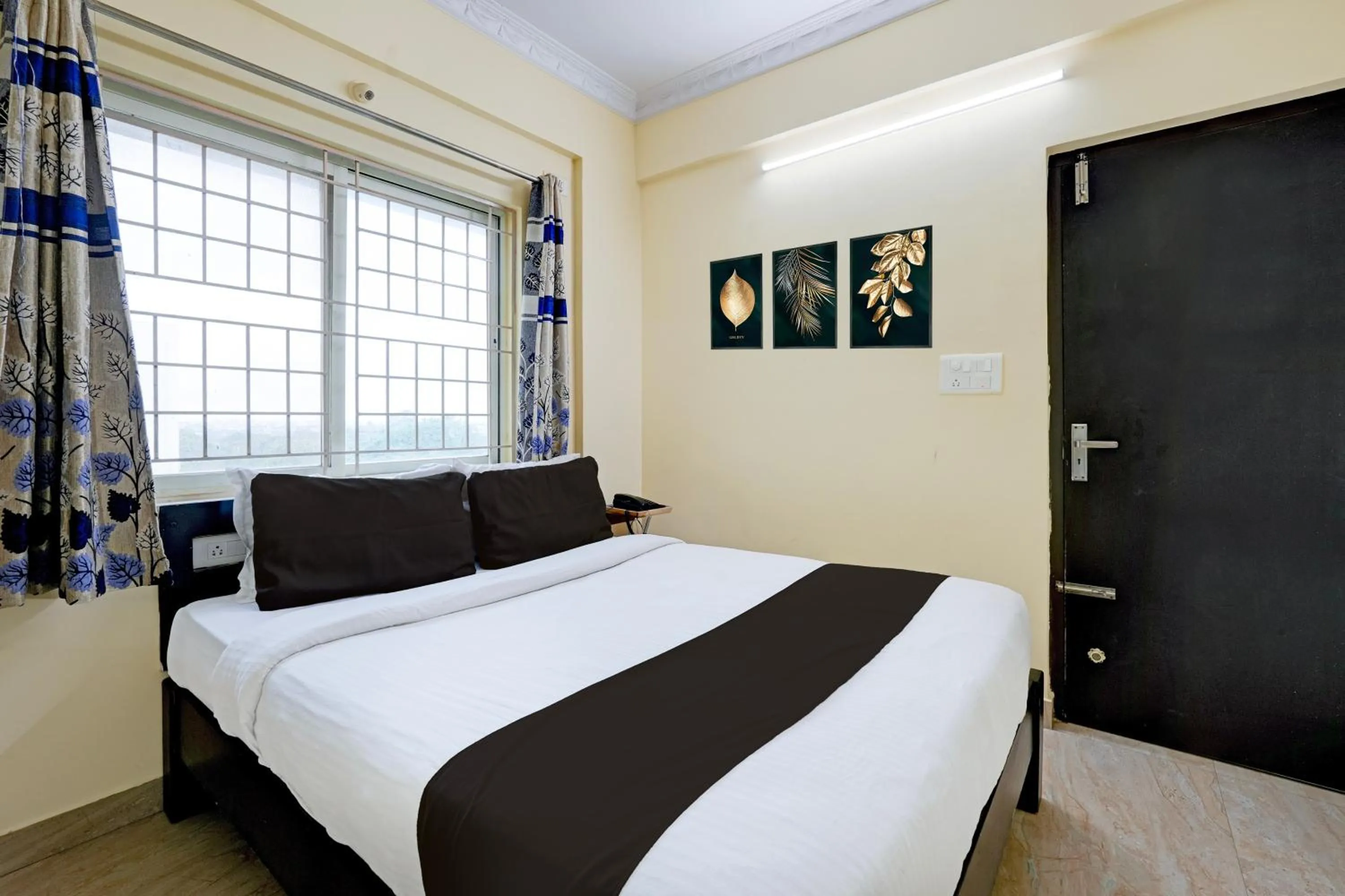 Bedroom in Hotel O Ganakkal Near BGS Hospital Junction formerly Omkar Inn.