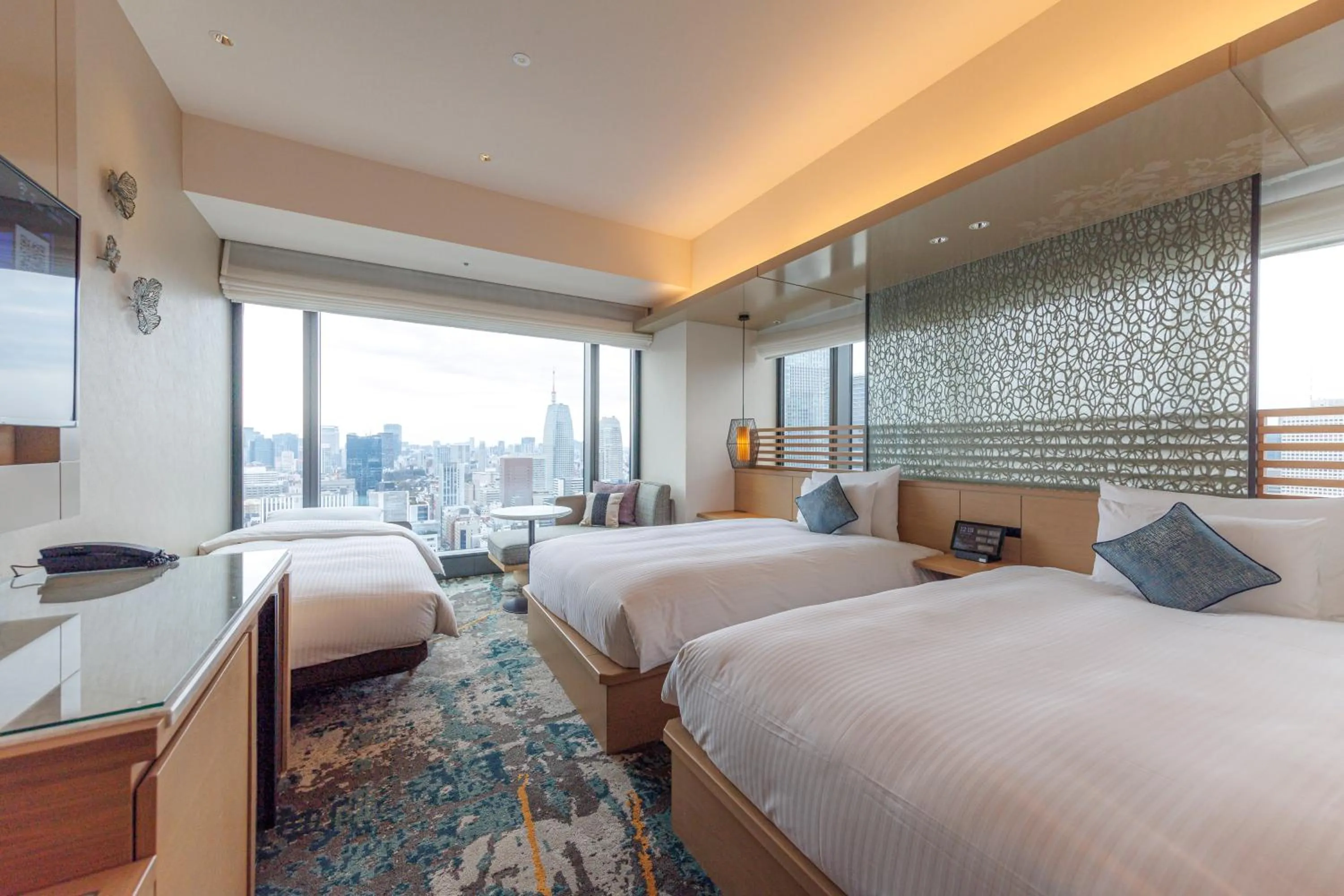 Bed in THE BLOSSOM HIBIYA