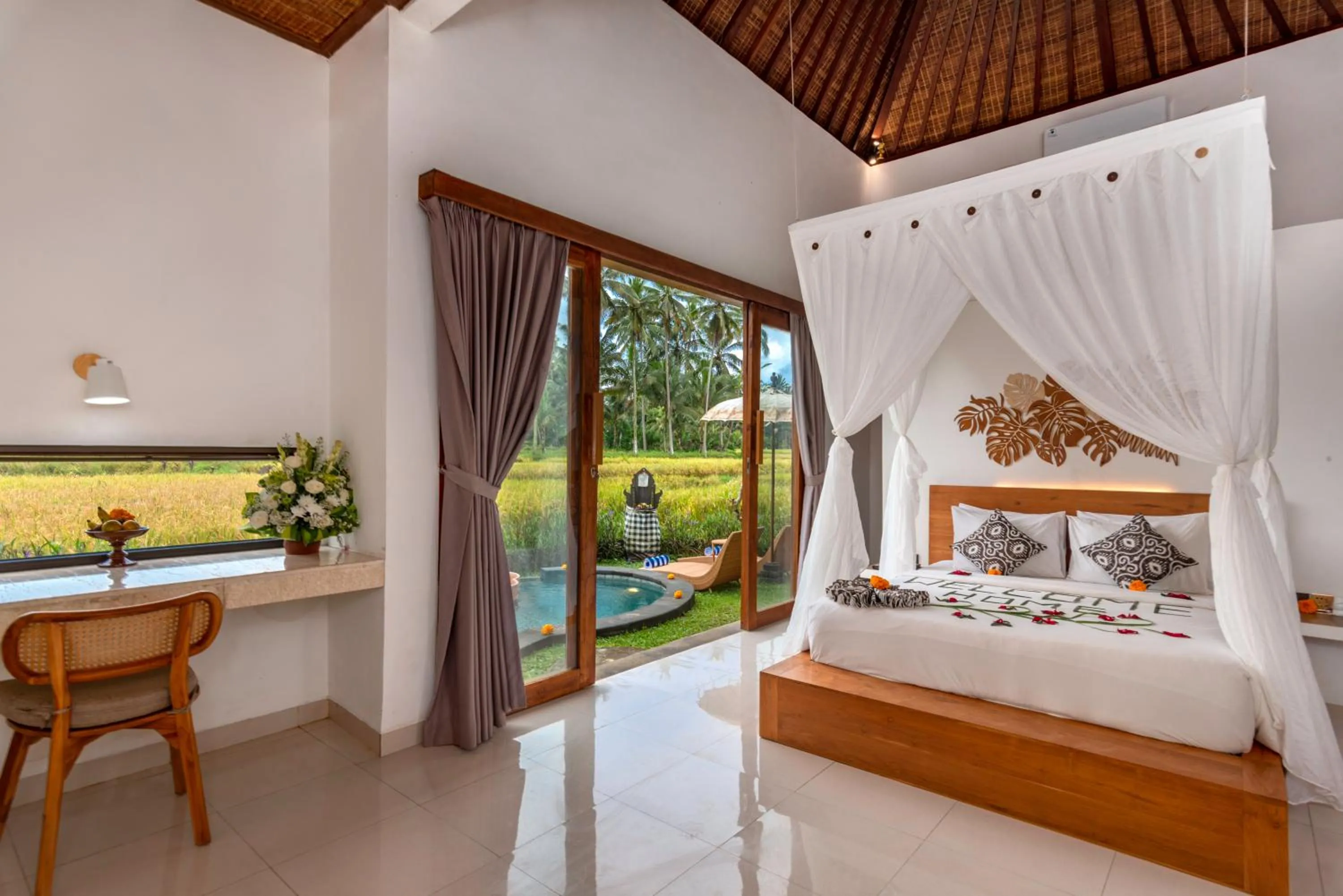 Bed in The Alus Cottage and Villa