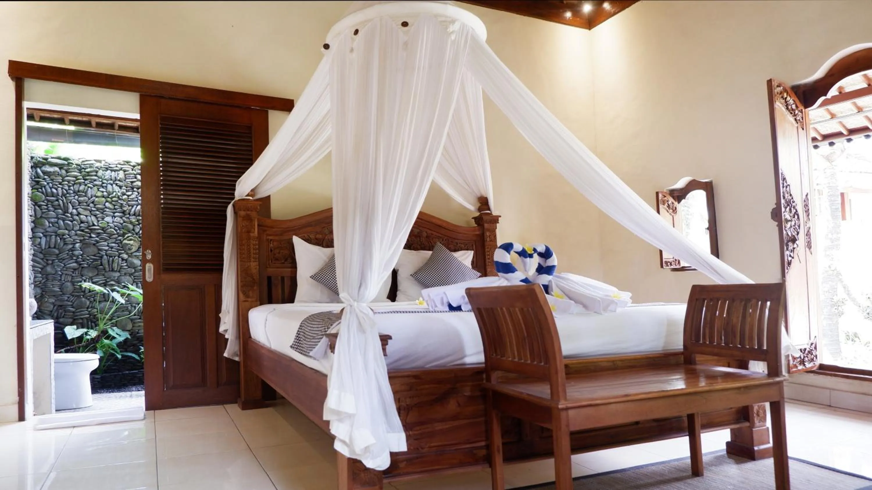 Bed in The Alus Cottage and Villa