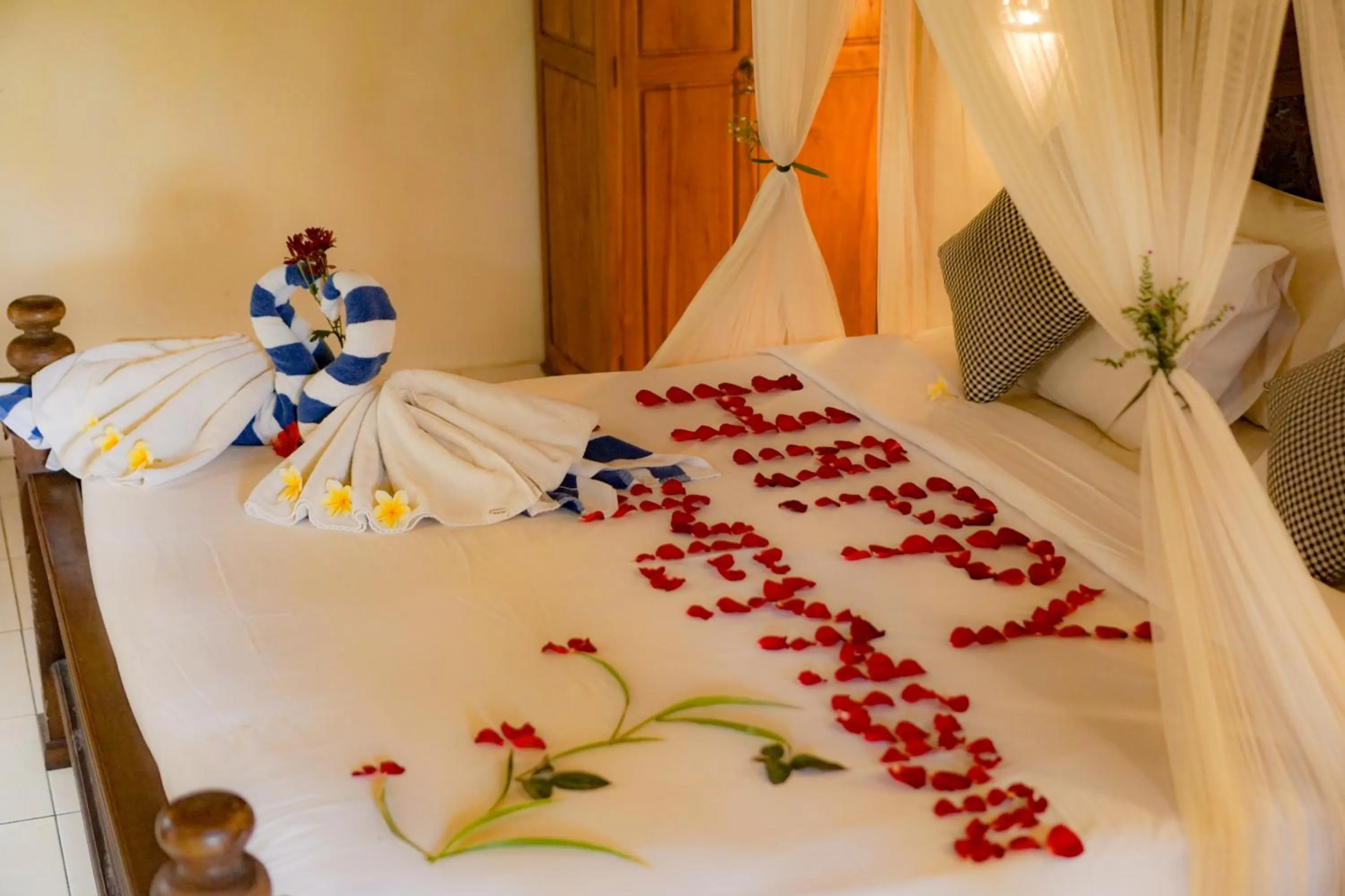 Bed in The Alus Cottage and Villa