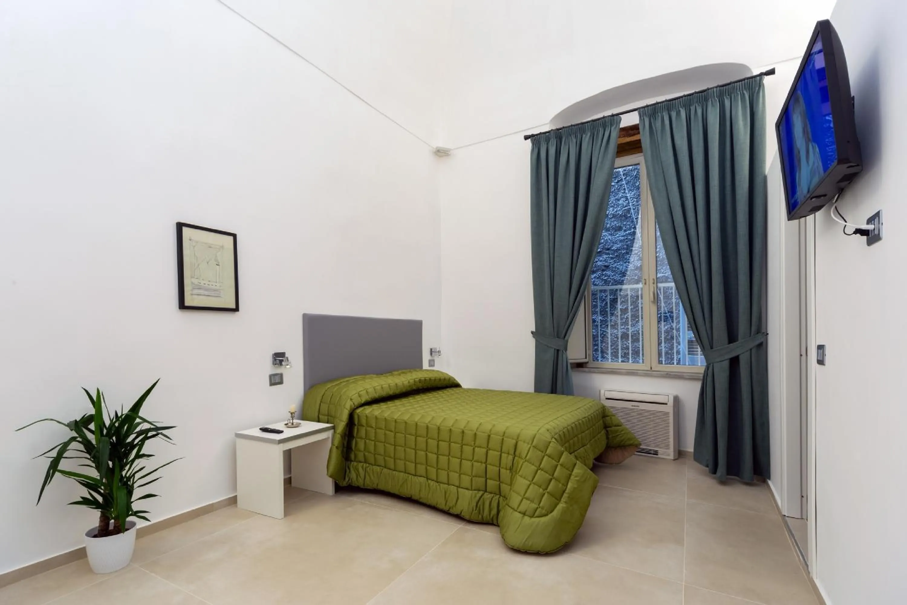 Bedroom in Il Tesoro Smart Suite & SPA