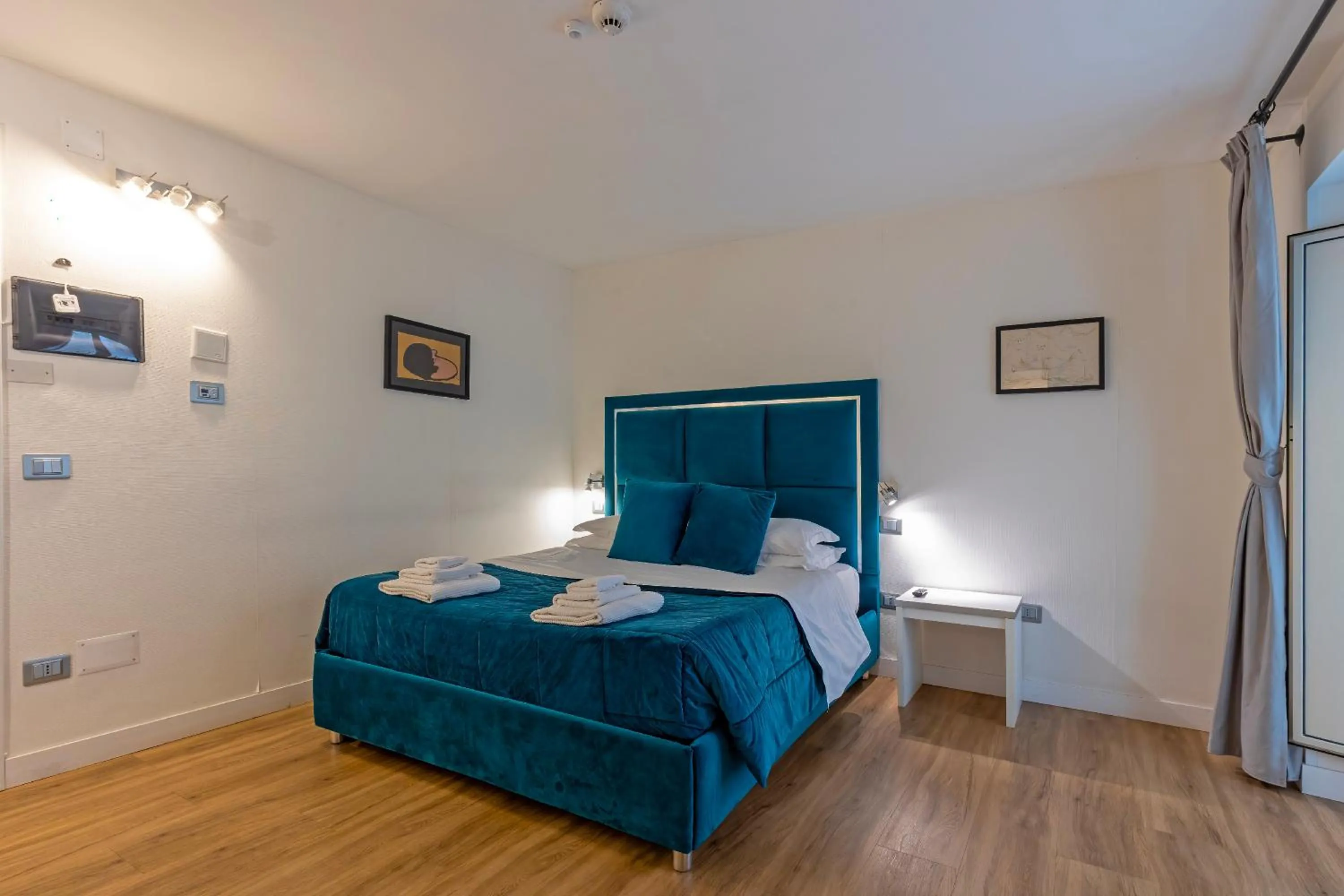 Bed in Il Tesoro Smart Suite & SPA