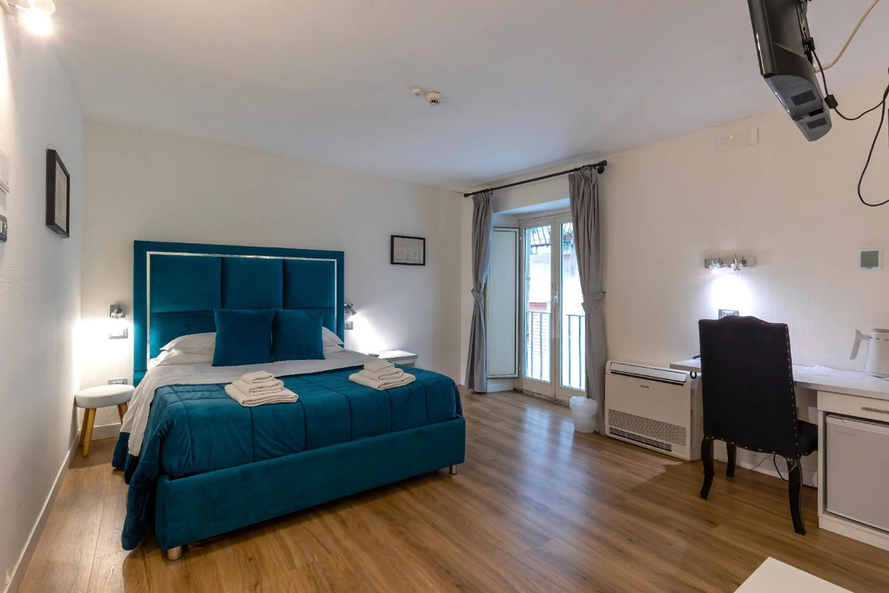 Bed in Il Tesoro Smart Suite & SPA