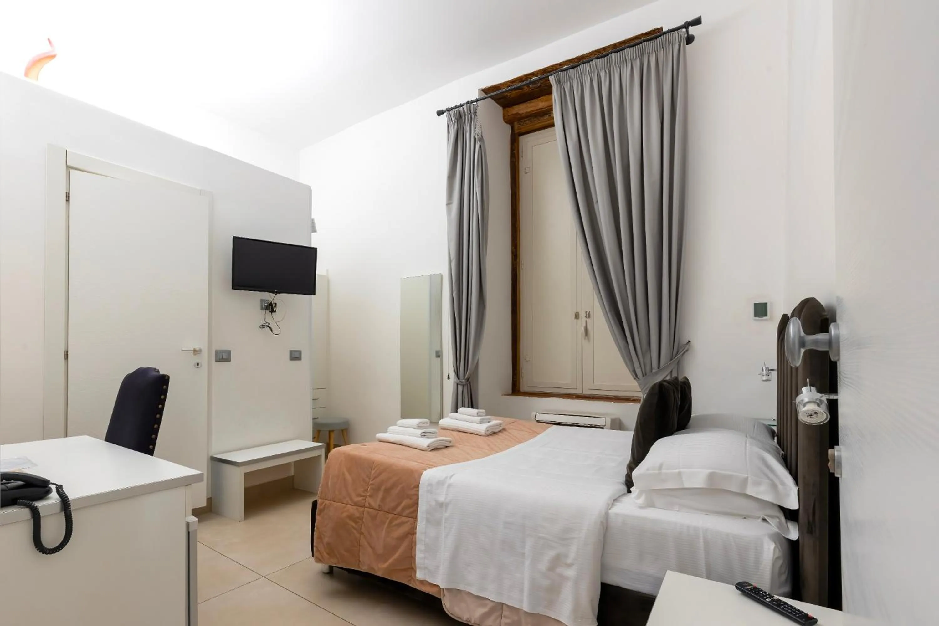 Bed in Il Tesoro Smart Suite & SPA