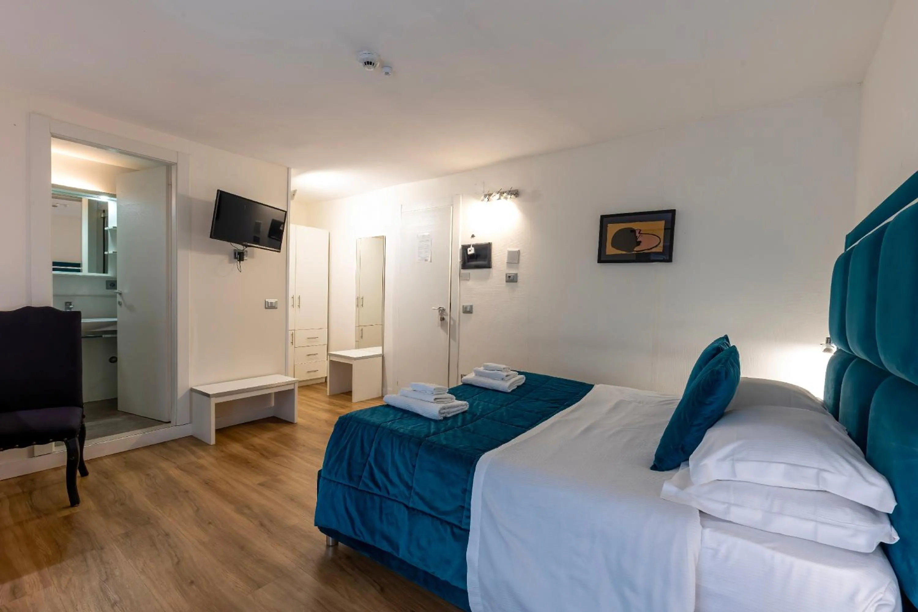 Bed in Il Tesoro Smart Suite & SPA