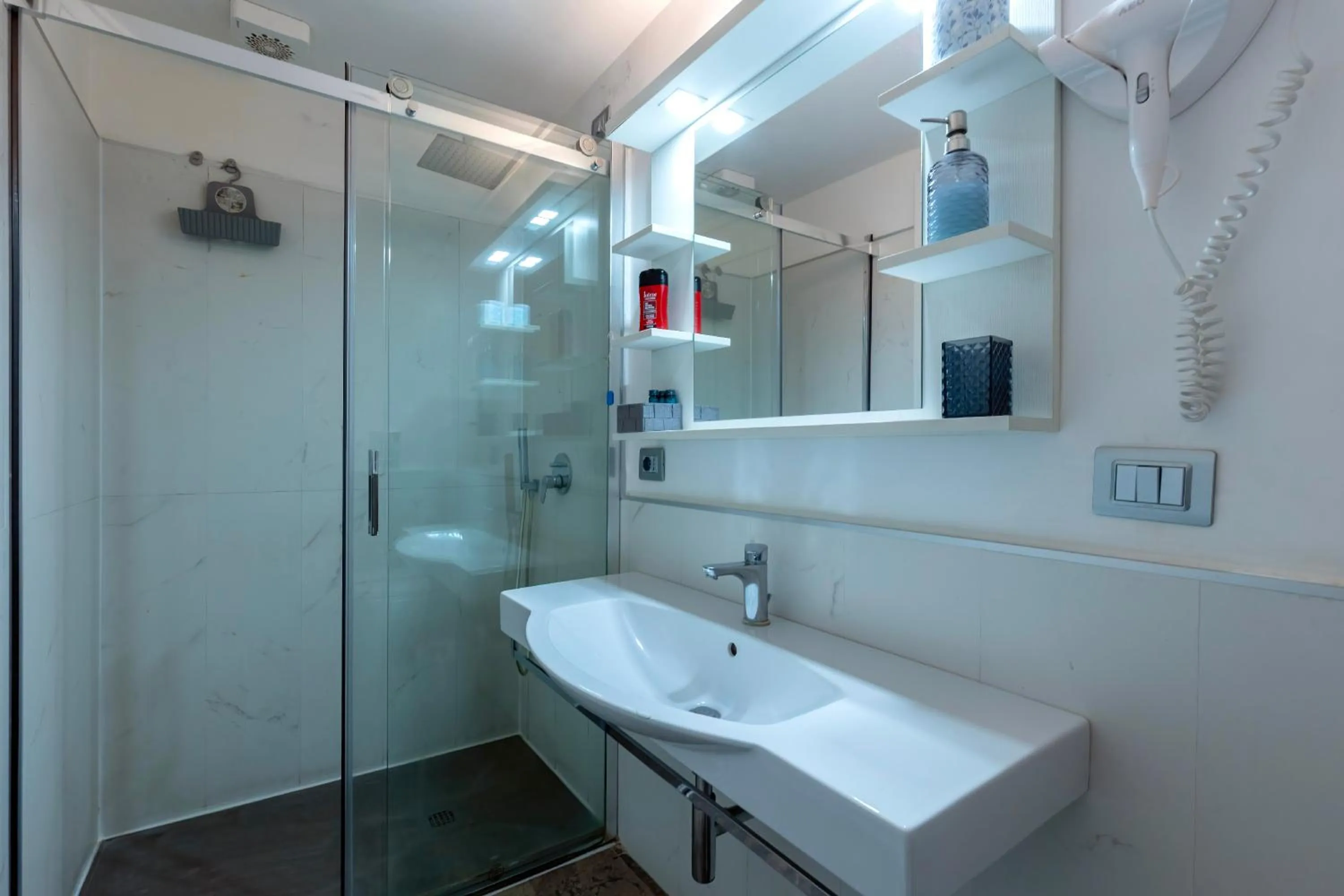 Bathroom in Il Tesoro Smart Suite & SPA