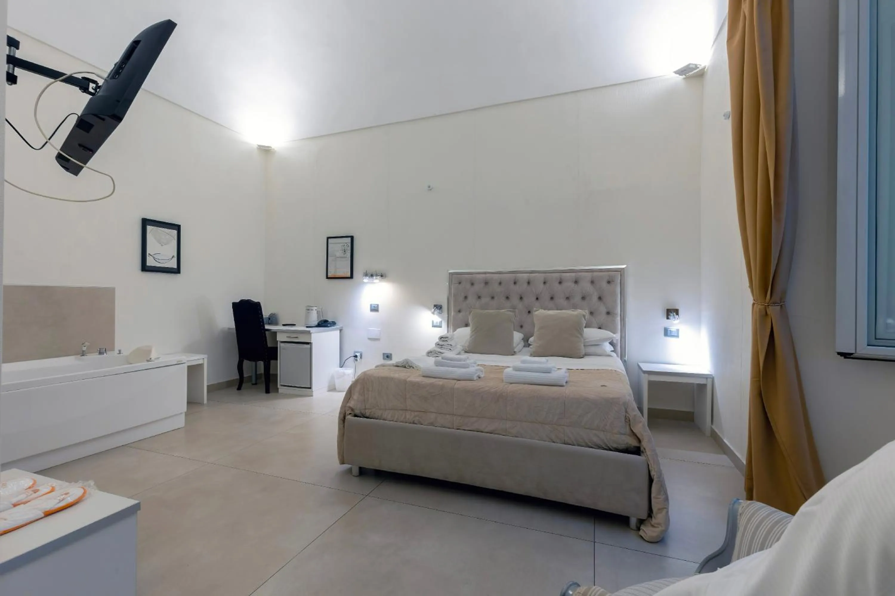 Bed in Il Tesoro Smart Suite & SPA