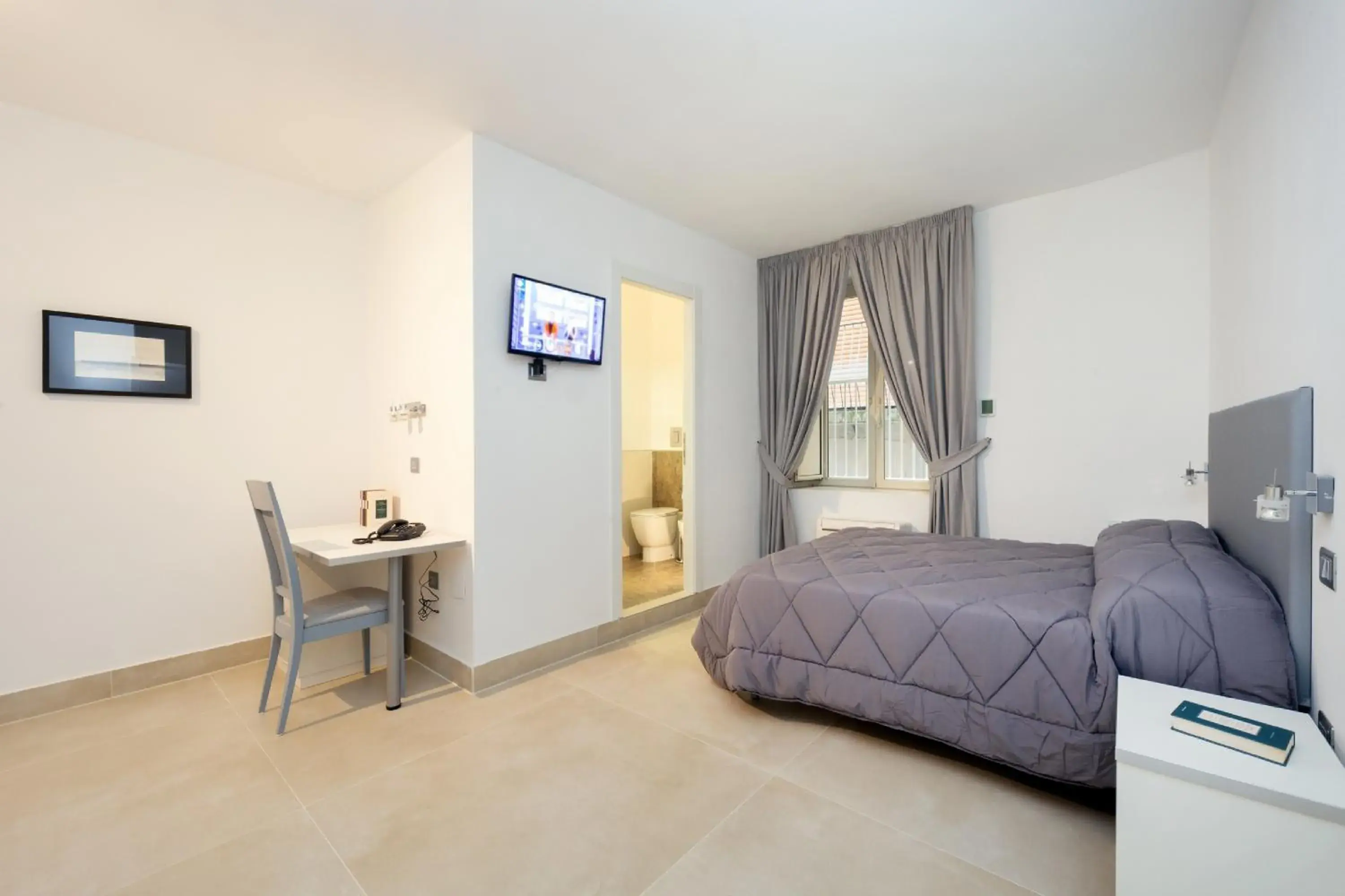 Photo of the whole room, Bed in Il Tesoro Smart Suite & SPA Photo of the whole room, Bed in Il Tesoro Smart Suite & SPA