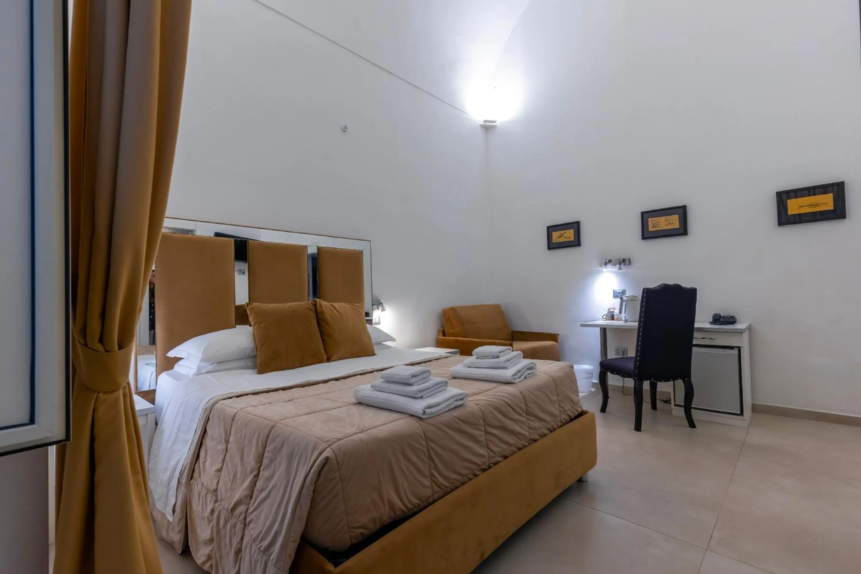 Bed in Il Tesoro Smart Suite & SPA