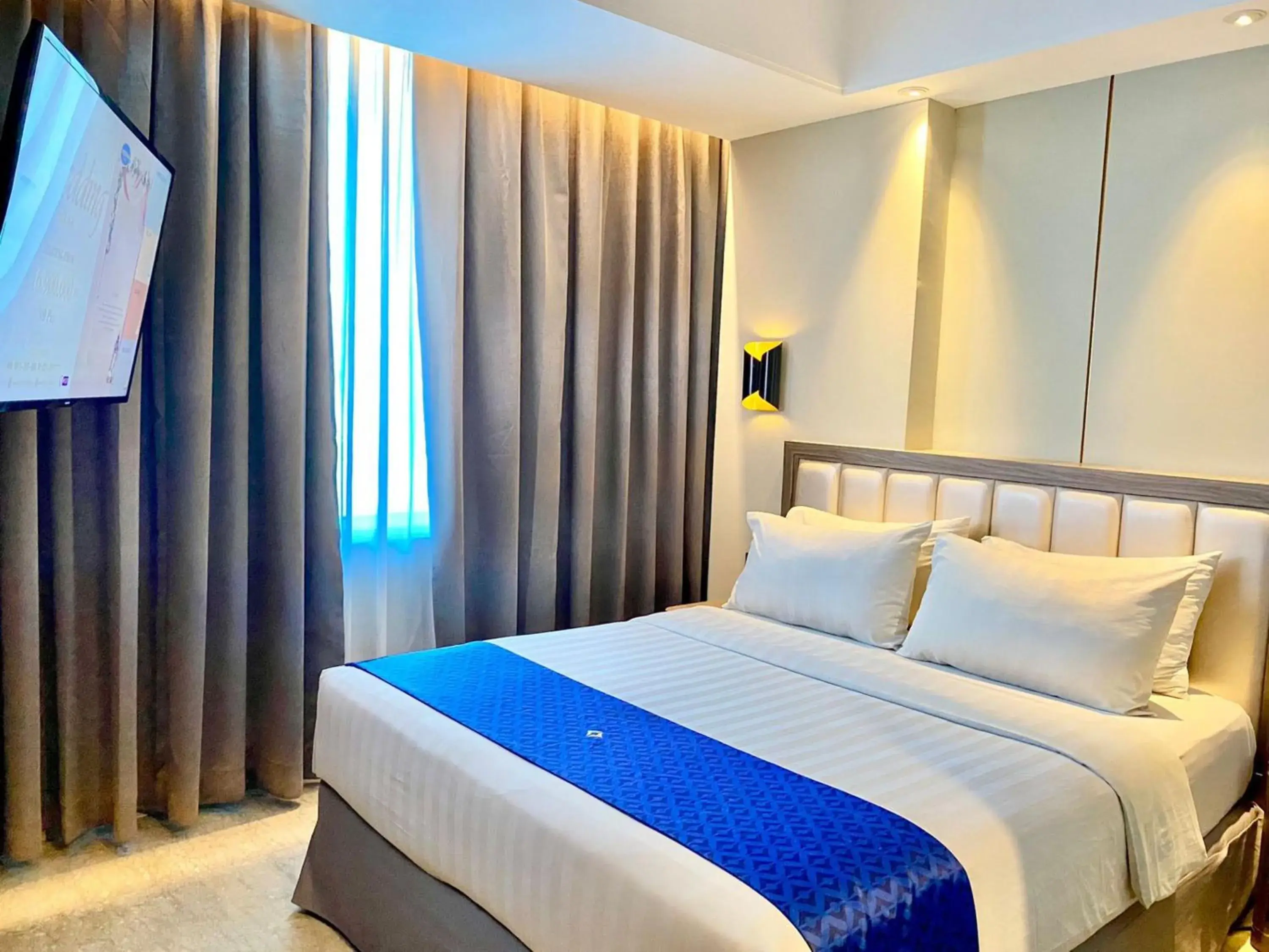 Bed in Arthama Hotel Wahid Hasyim Jakarta