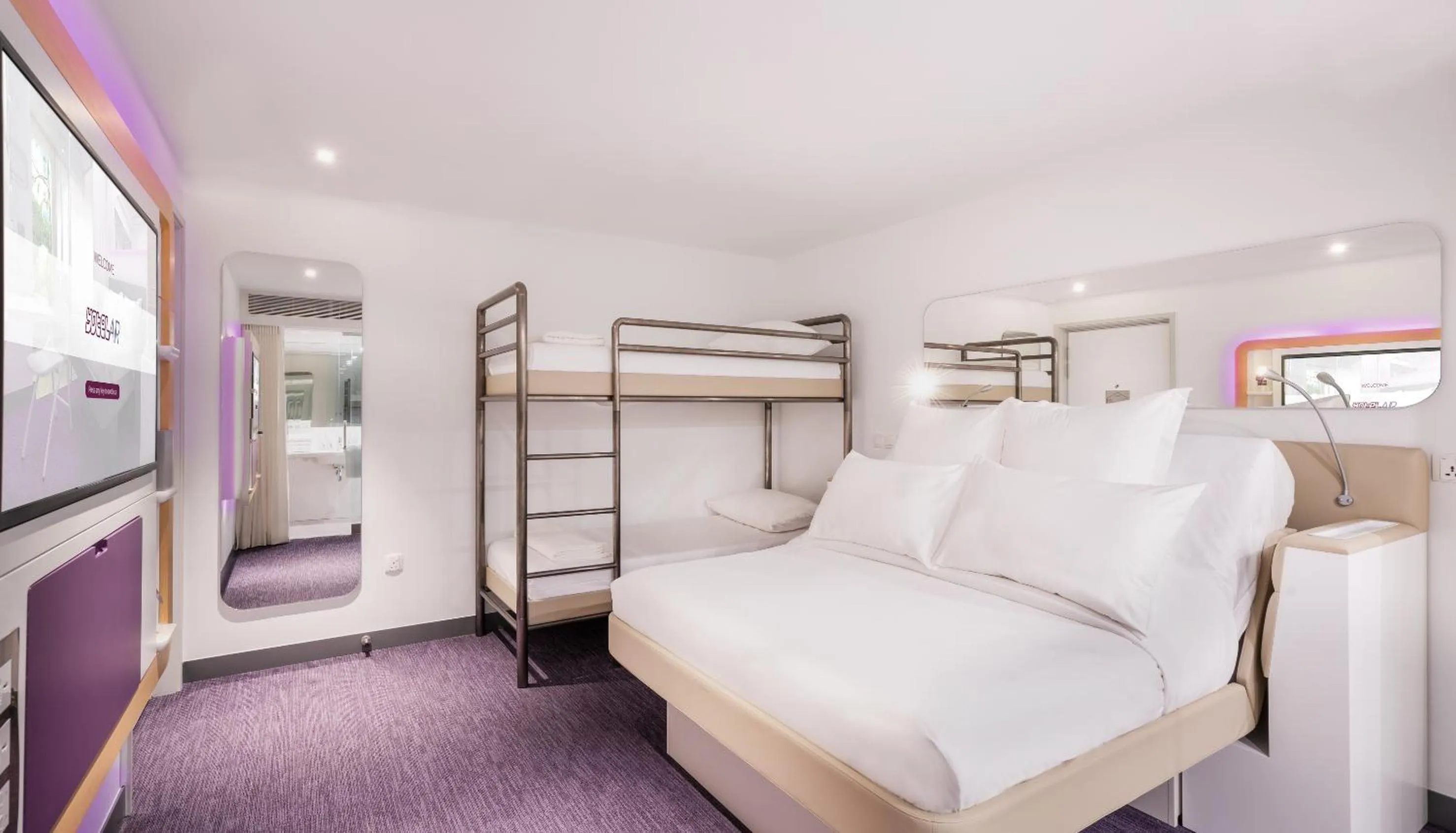 Photo of the whole room, Bed in YOTELAIR Singapore Changi Airport Landside