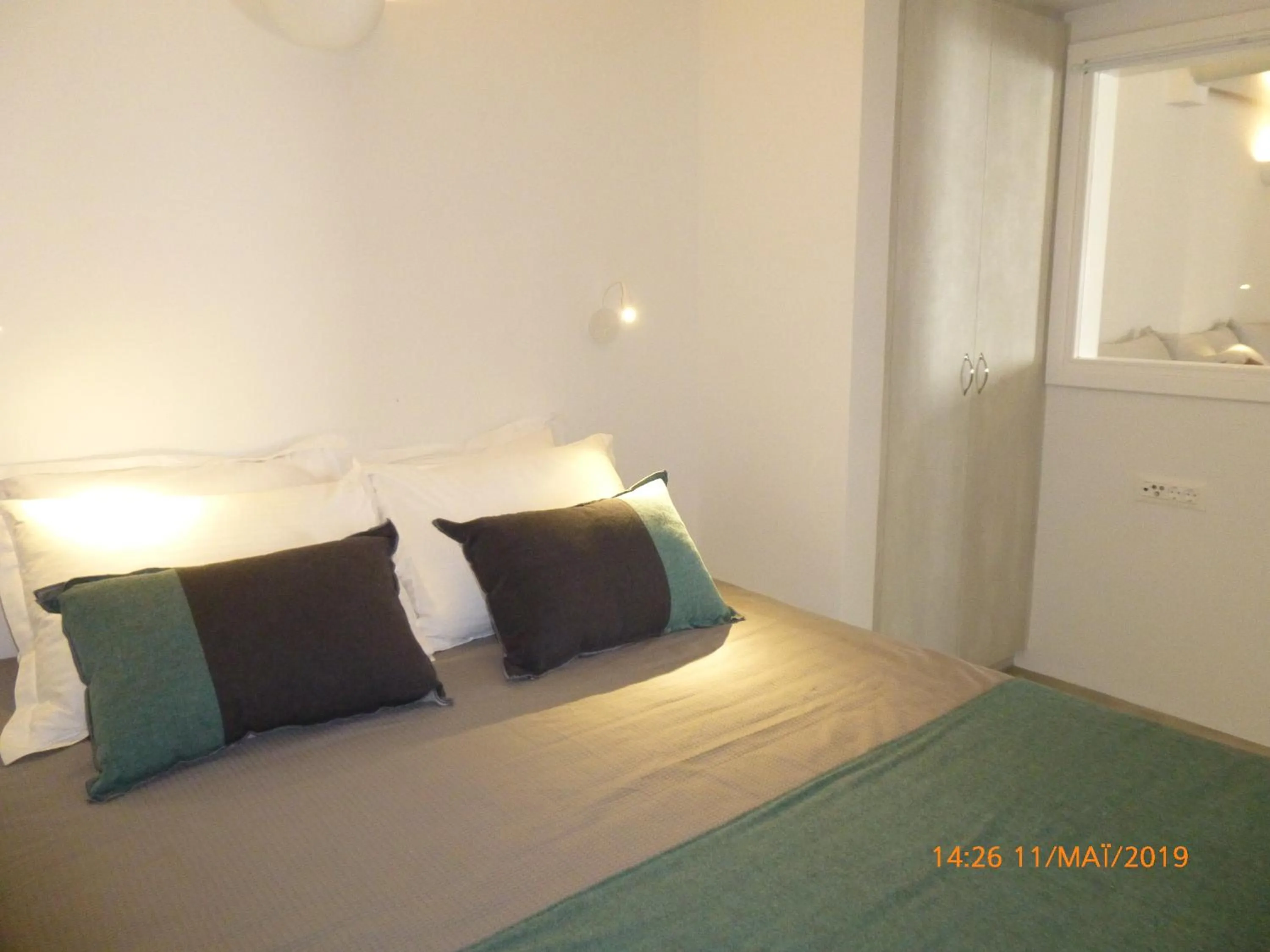 Bed in Aplada Suites