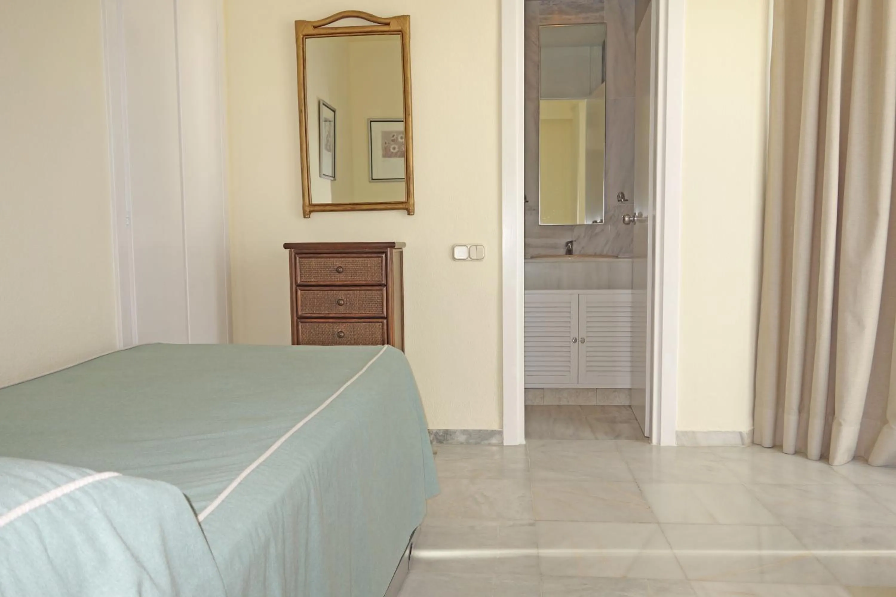 Bed in Marbella House Penthouse