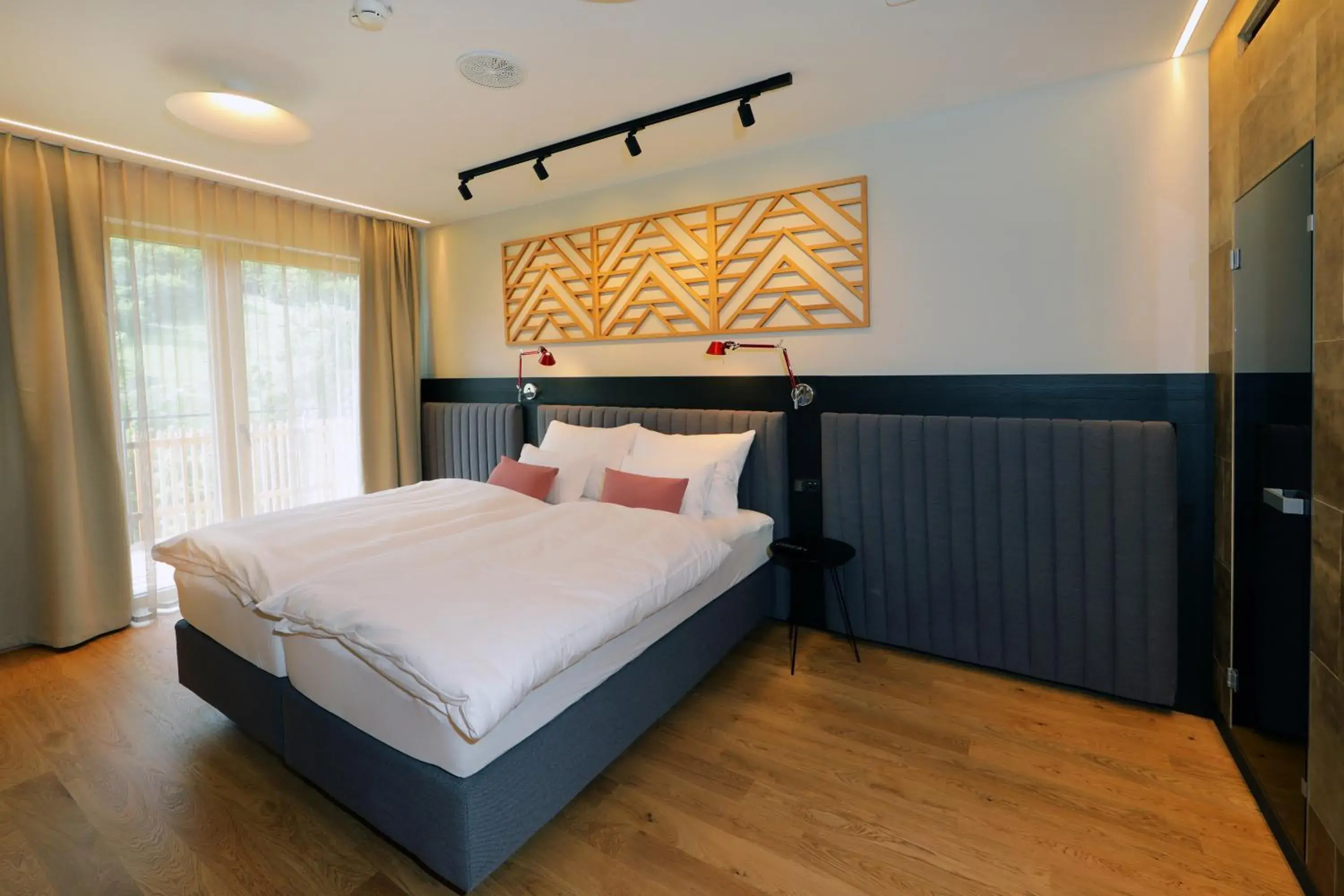 Bedroom, Bed in Hotel Steiermarkhof Graz - Aus Holz gebaut, von Hügeln geküsst Bedroom, Bed in Hotel Steiermarkhof Graz - Aus Holz gebaut, von Hügeln geküsst