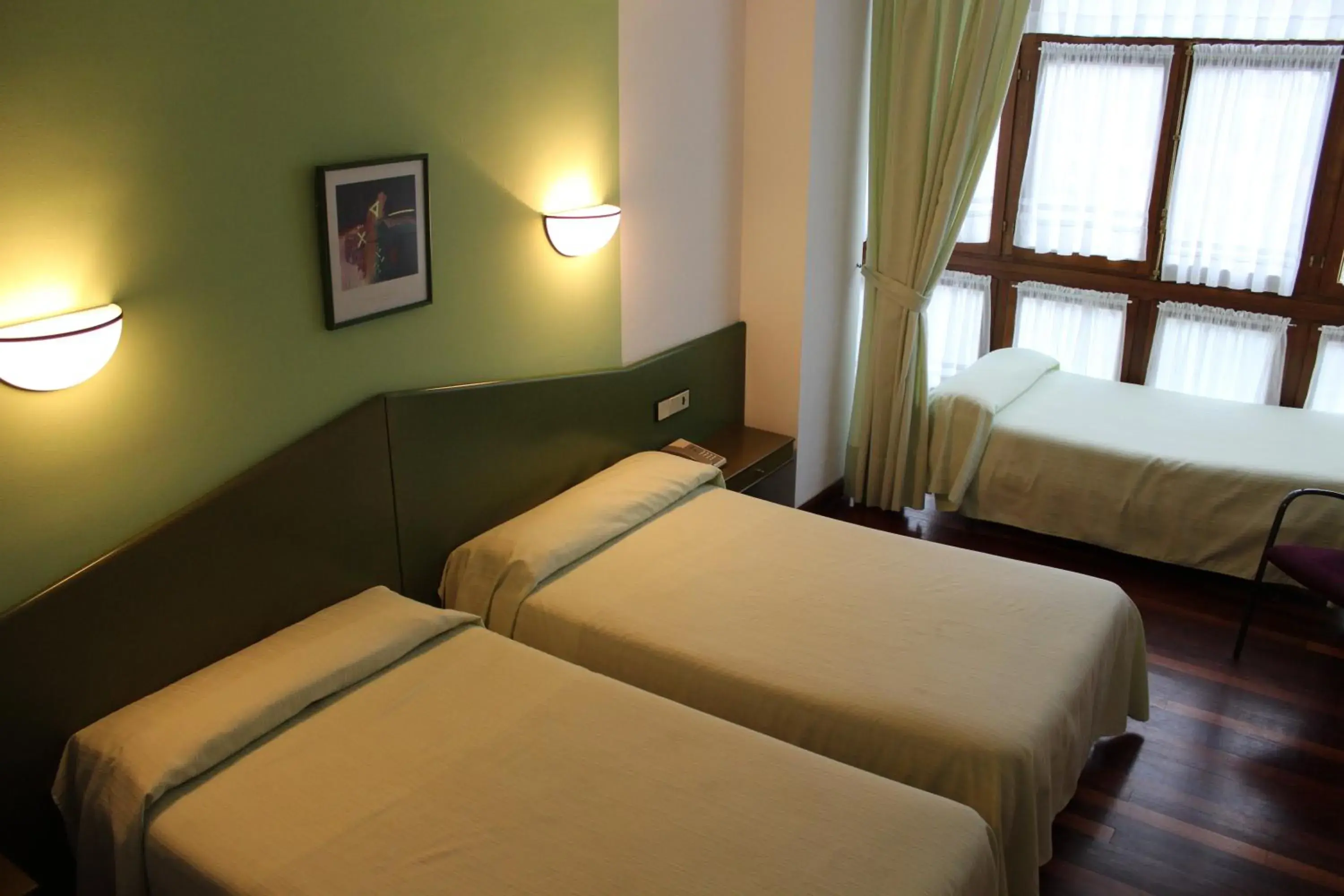 Triple Room in Hotel Sindika Triple Room in Hotel Sindika