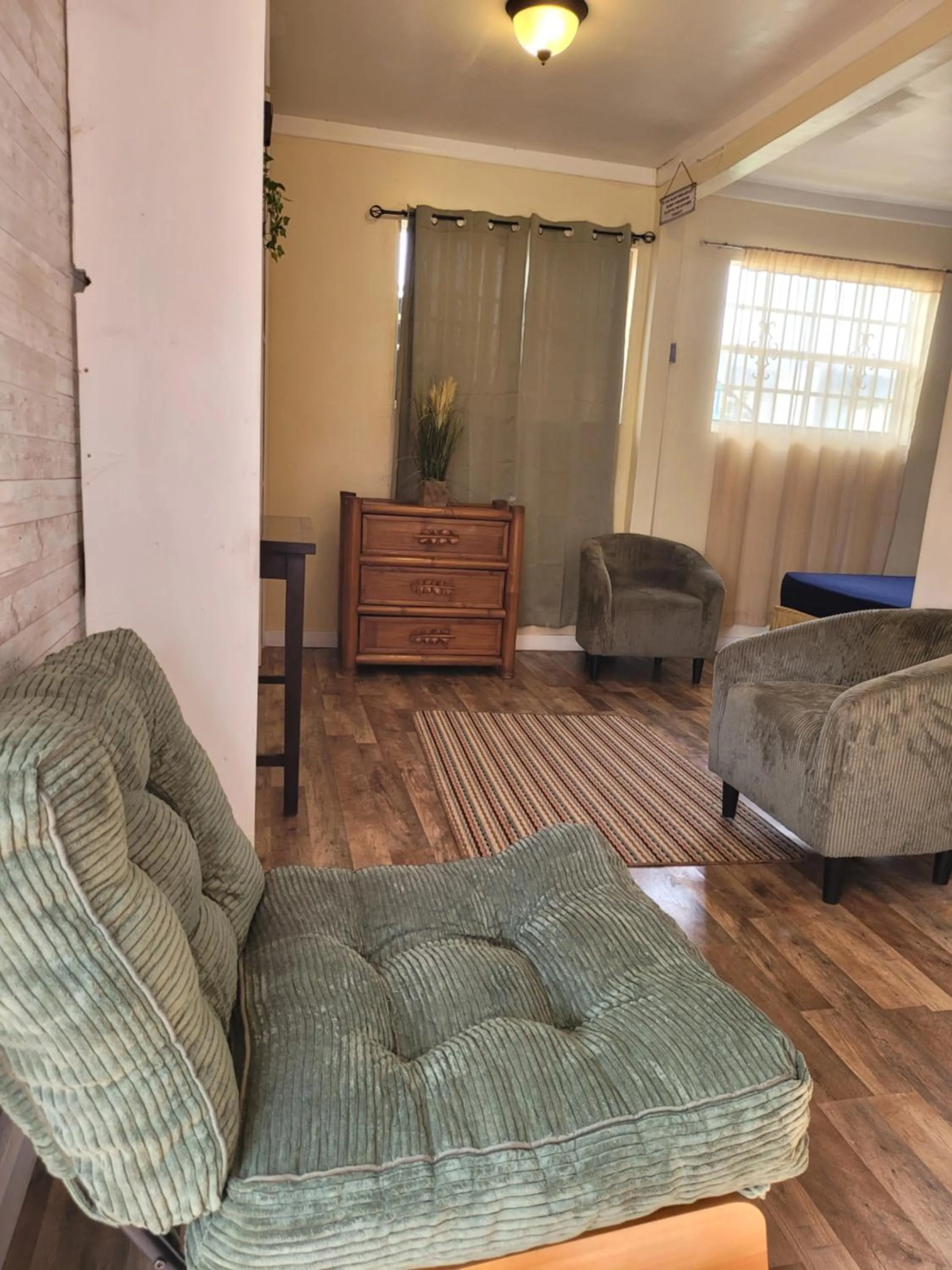 Seating area in Cocoplum Rest N Hideaway #1