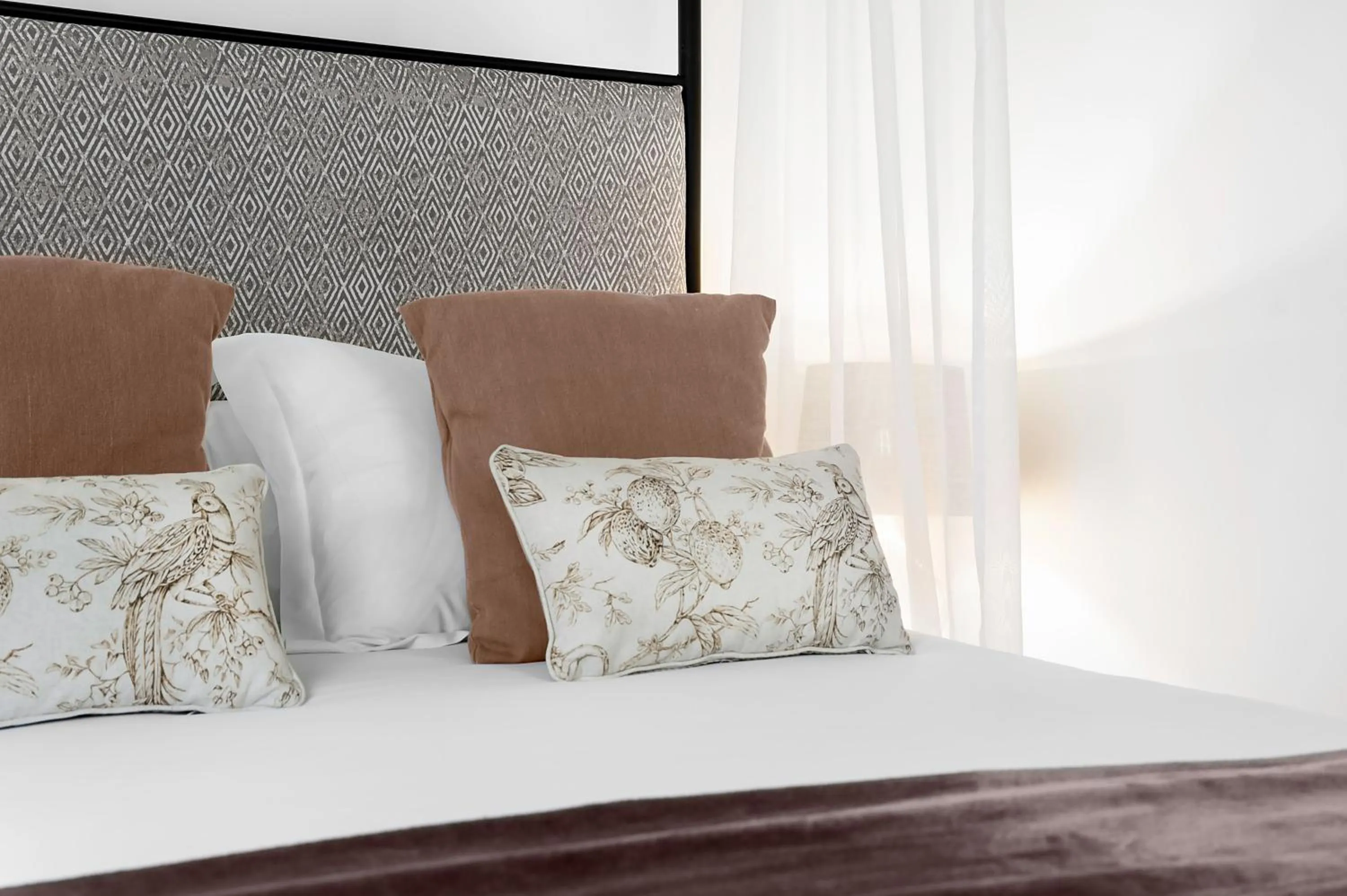 Bed in Hotel Mercader de Sedas by Maxi Hoteles