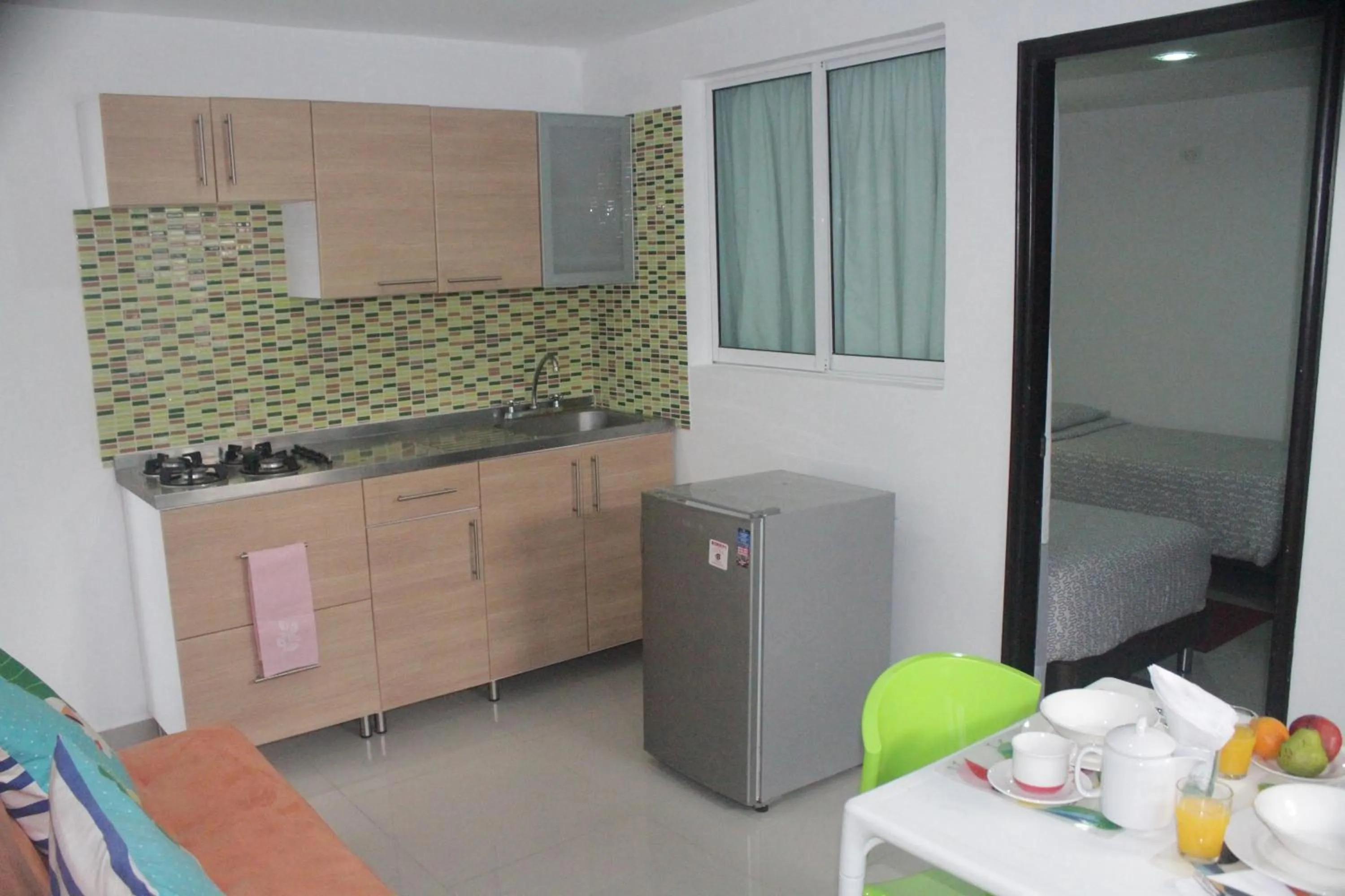 Kitchen or kitchenette in Hotel Golden House