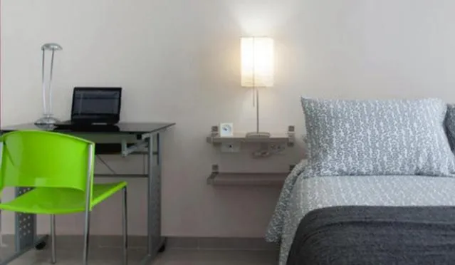 Bed in Hotel Golden House