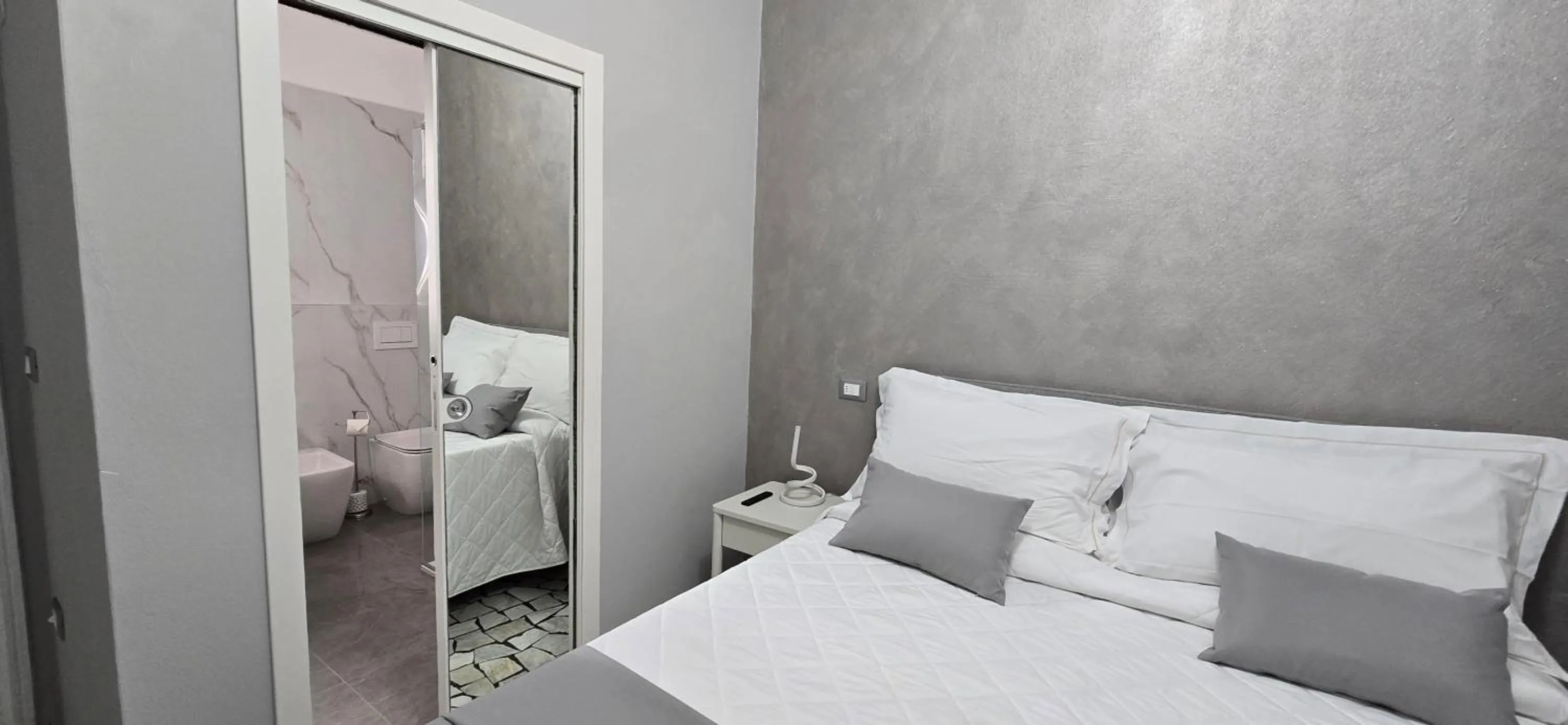 Bed in HOTEL PARADISO