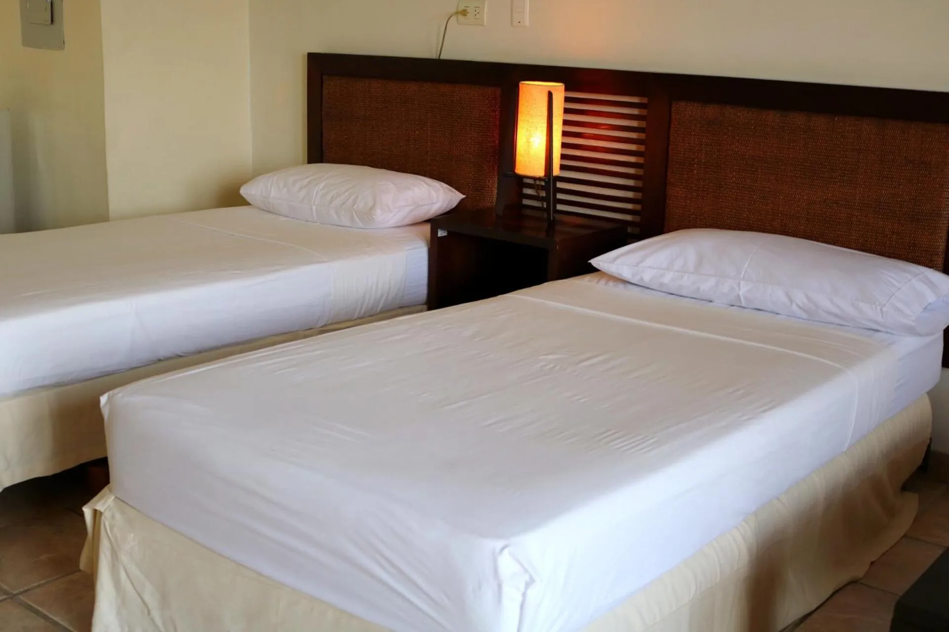 Bed in Hotel Peñon Suites