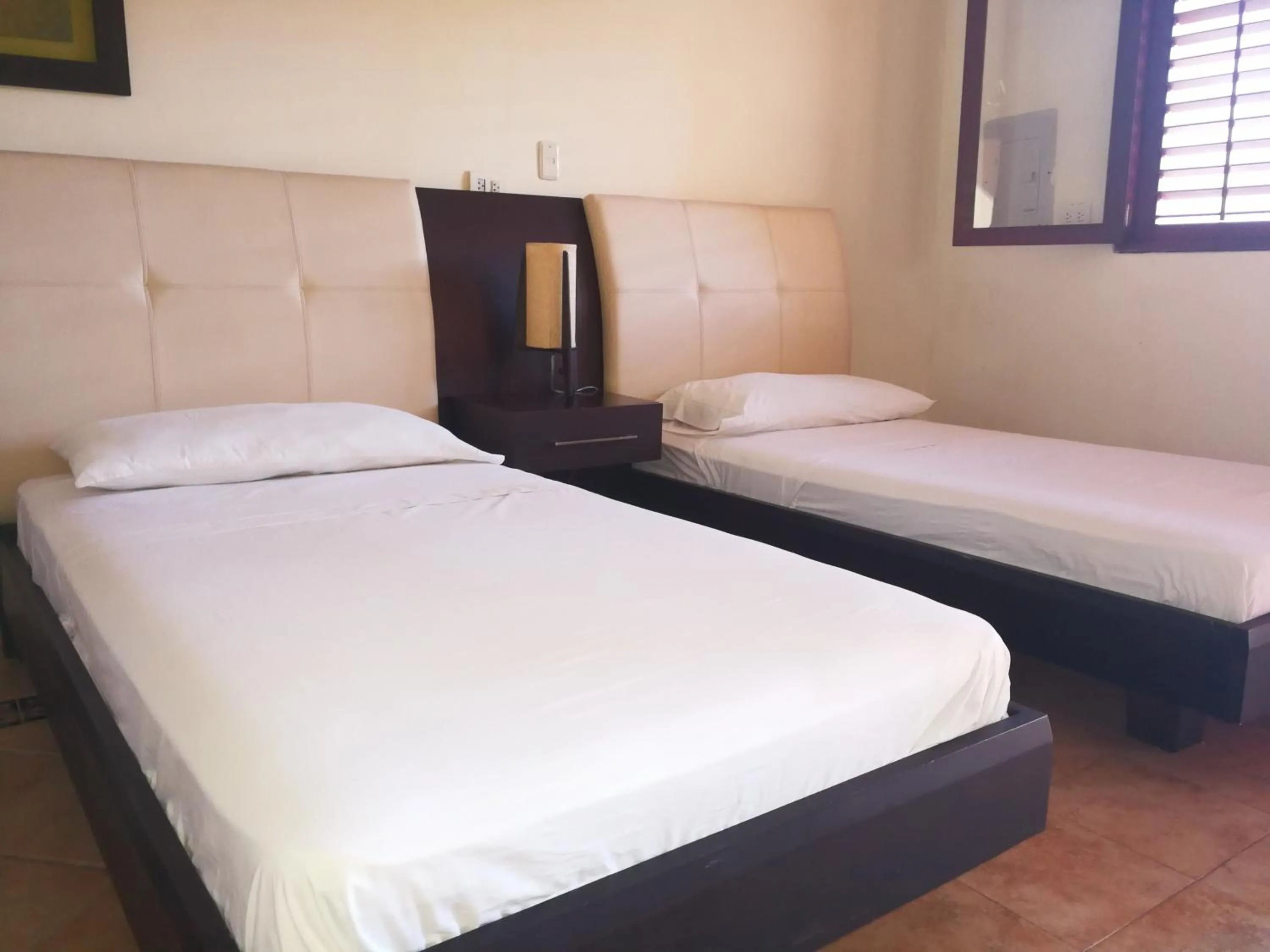 Bedroom, Bed in Hotel Peñon Suites
