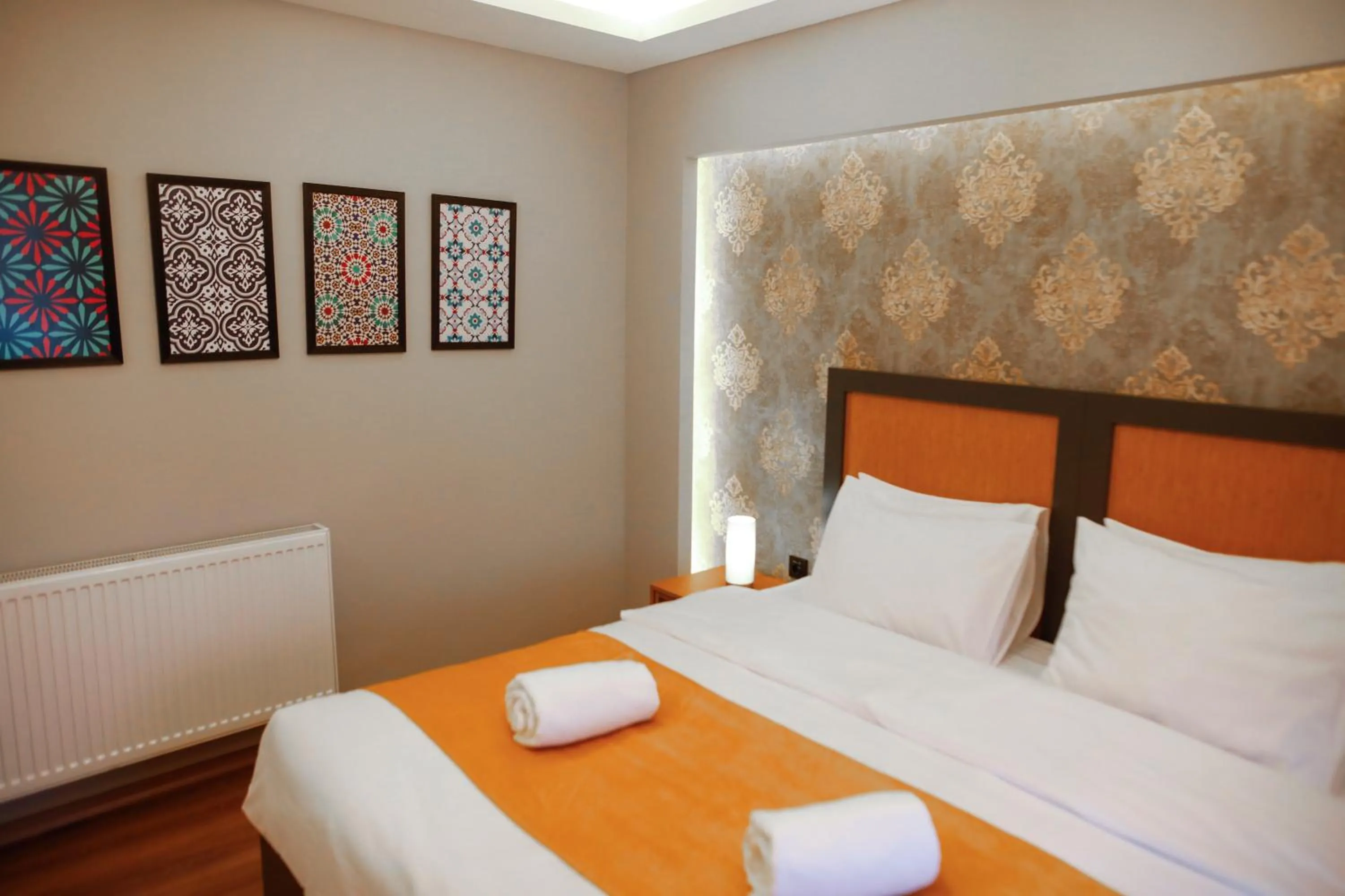 Bed in Umut Apartments